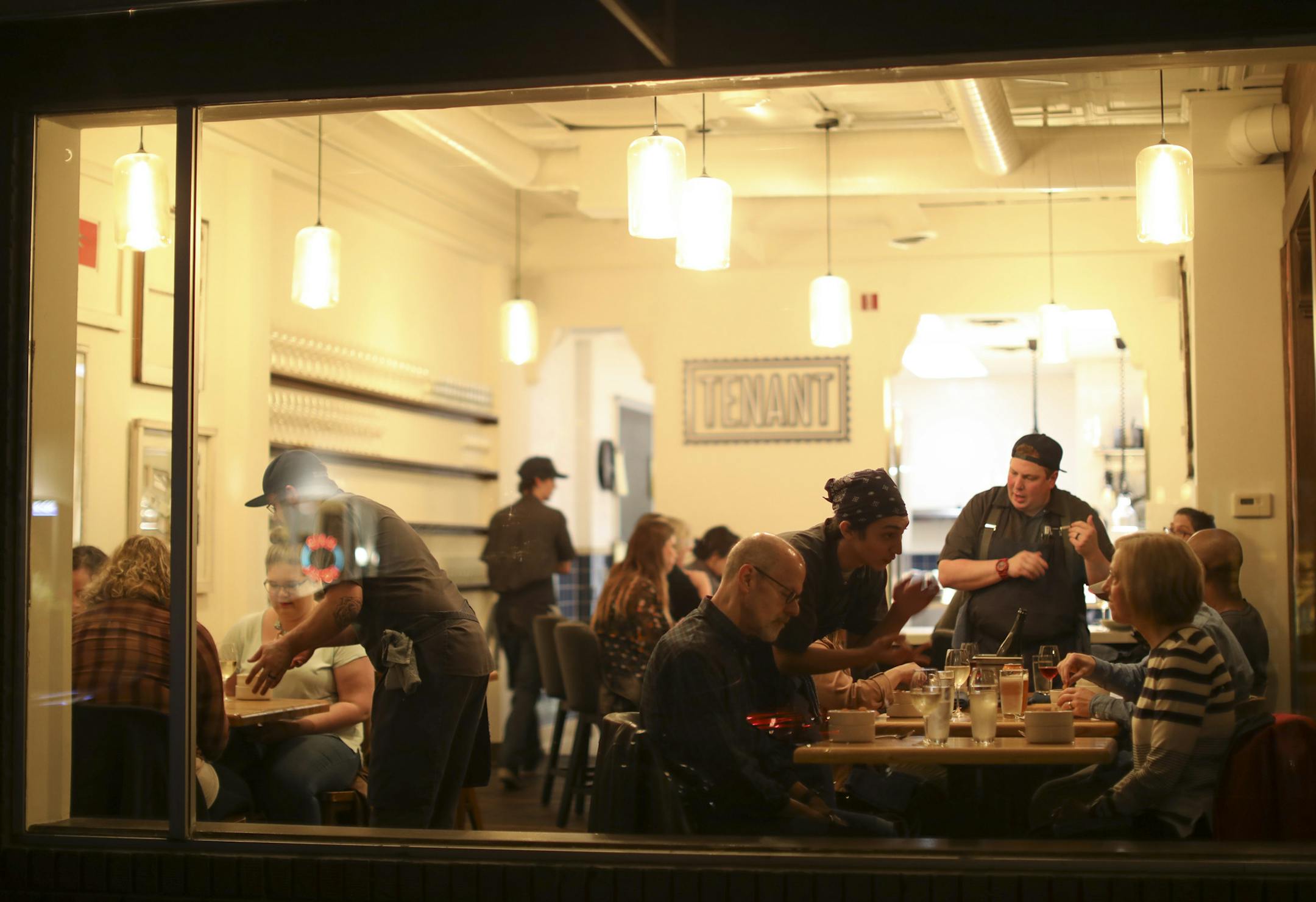 At Tenant, the chefs in the kitchen are also servers in the dining room.