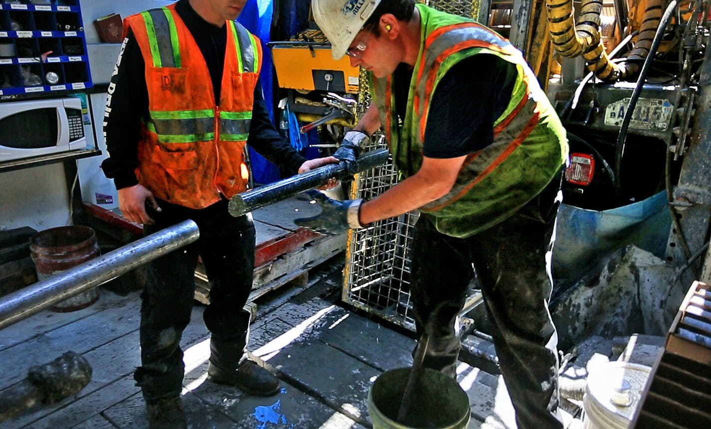 Drillers for Twin Metals, at a site near the Kiwishiwi River, pulled a core sample from a drill pipe in 2013.