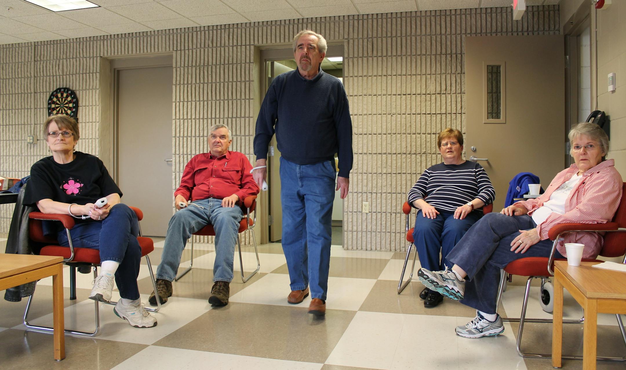 By LIALA HELAL Ron Bailey, center, plays Wii bowling at the Lakeville Senior Center as his group members look on. From left are Doraine Ryan, Tom Holten, Ron Bailey, Joann Teal and Margaret Havemeier.