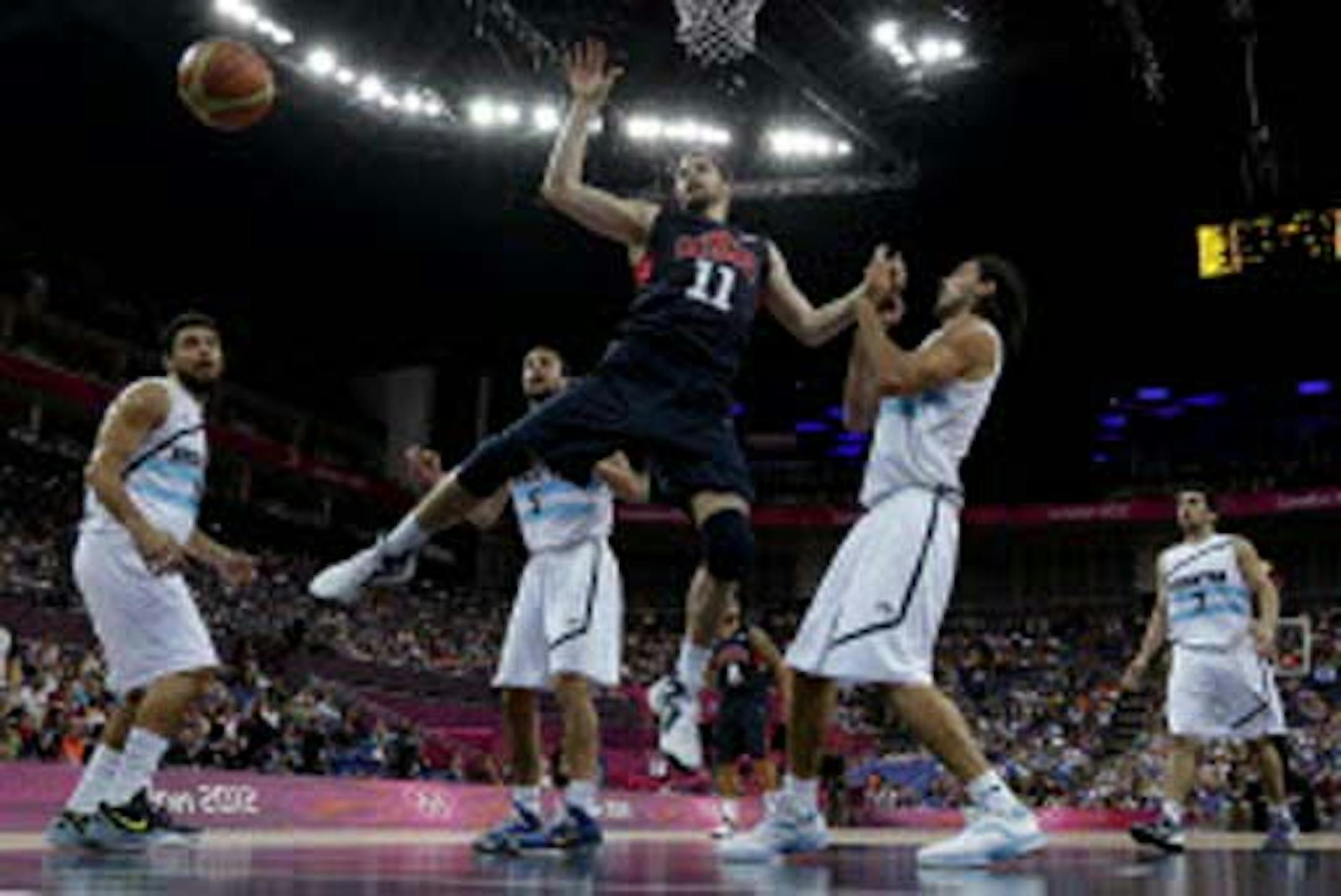 In only 15 minutes of play in Team USA's semifinal victory over Argentine, the Wolves' Kevin Love (11) collected nine points and nine rebounds.