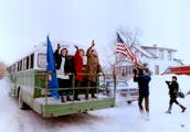 December 29, 1990 Paul Wellstone leaves for DC in the bus from in front of the Croatian Hall in S. St. Paul Saturday am L-R: Daughter Marcia, wife She