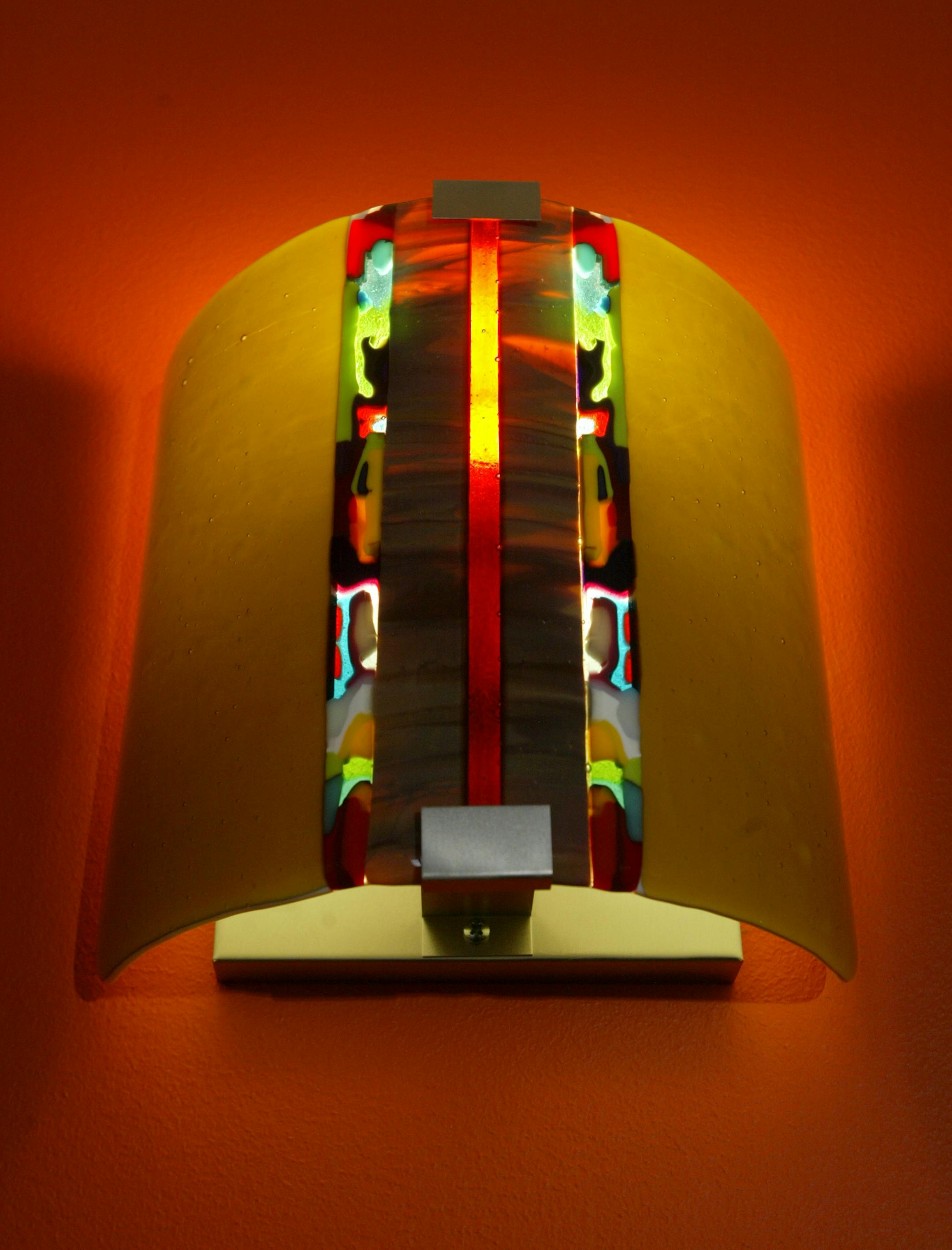 Bill Humphries and Heide Hardner of Minneapolis used an artist friend to create wall sconces in the stairway.