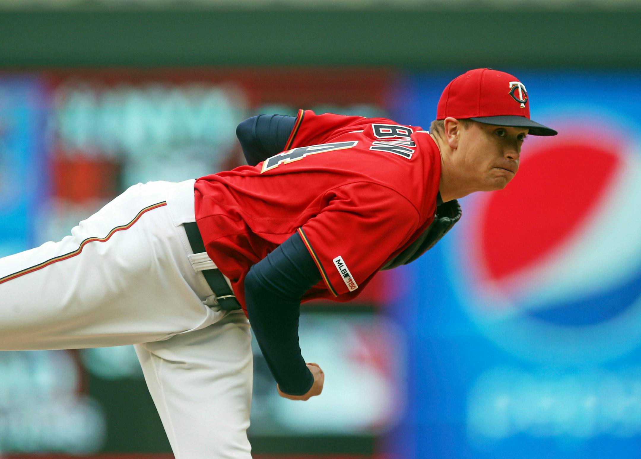 Minnesota Twins pitcher Kyle Gibson throws against the Baltimore Orioles in the sixth inning of a baseball game Sunday, April 28, 2019, in Minneapolis. The Twins won 4-1, with Gibson picking up his second win. (AP Photo/Jim Mone)