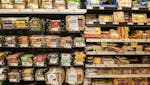 FILE -- Plant-based meat substitutes are displayed alongside meat products at a supermarket in New York on Aug. 30, 2019. Millennials are gobbling dow