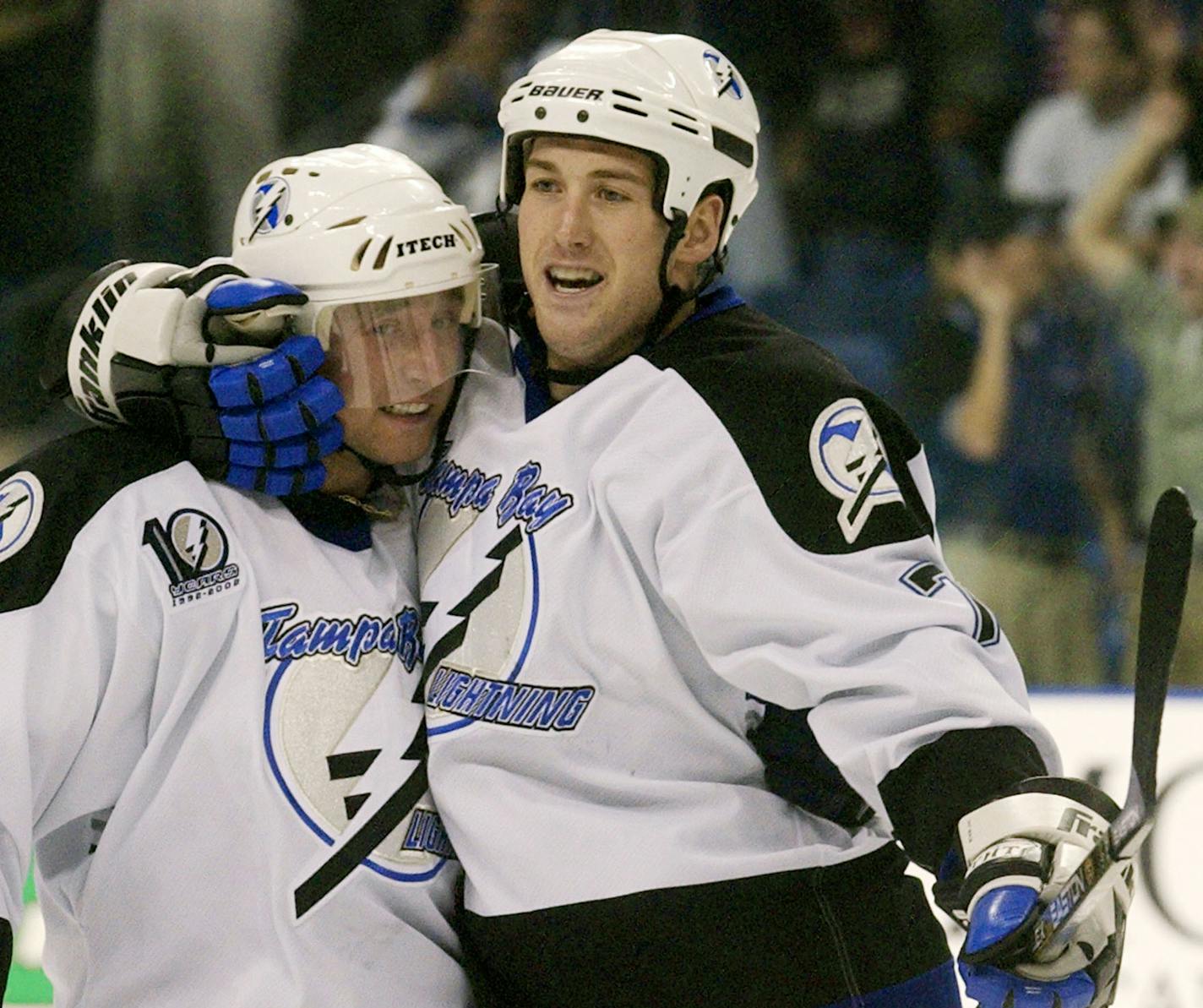 Tampa Bay Lightning right wing Ben Clymer (7) celebrates his goal against the New York Rangers with center Vaclav Prospal in 2001.