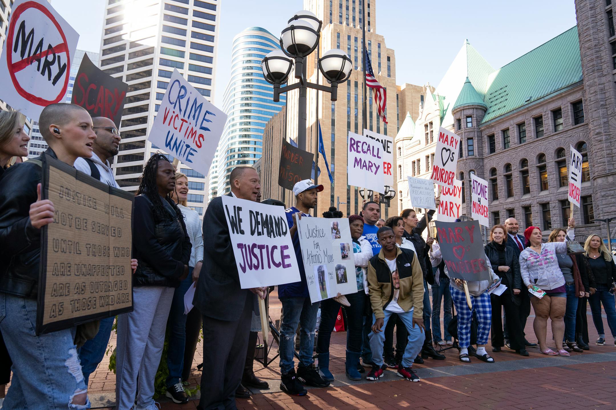 Victims of crimes and the families of victims rally in protest of Hennepin County Attorney Mary Moriarty outside the Hennepin County Government Center in Minneapolis.