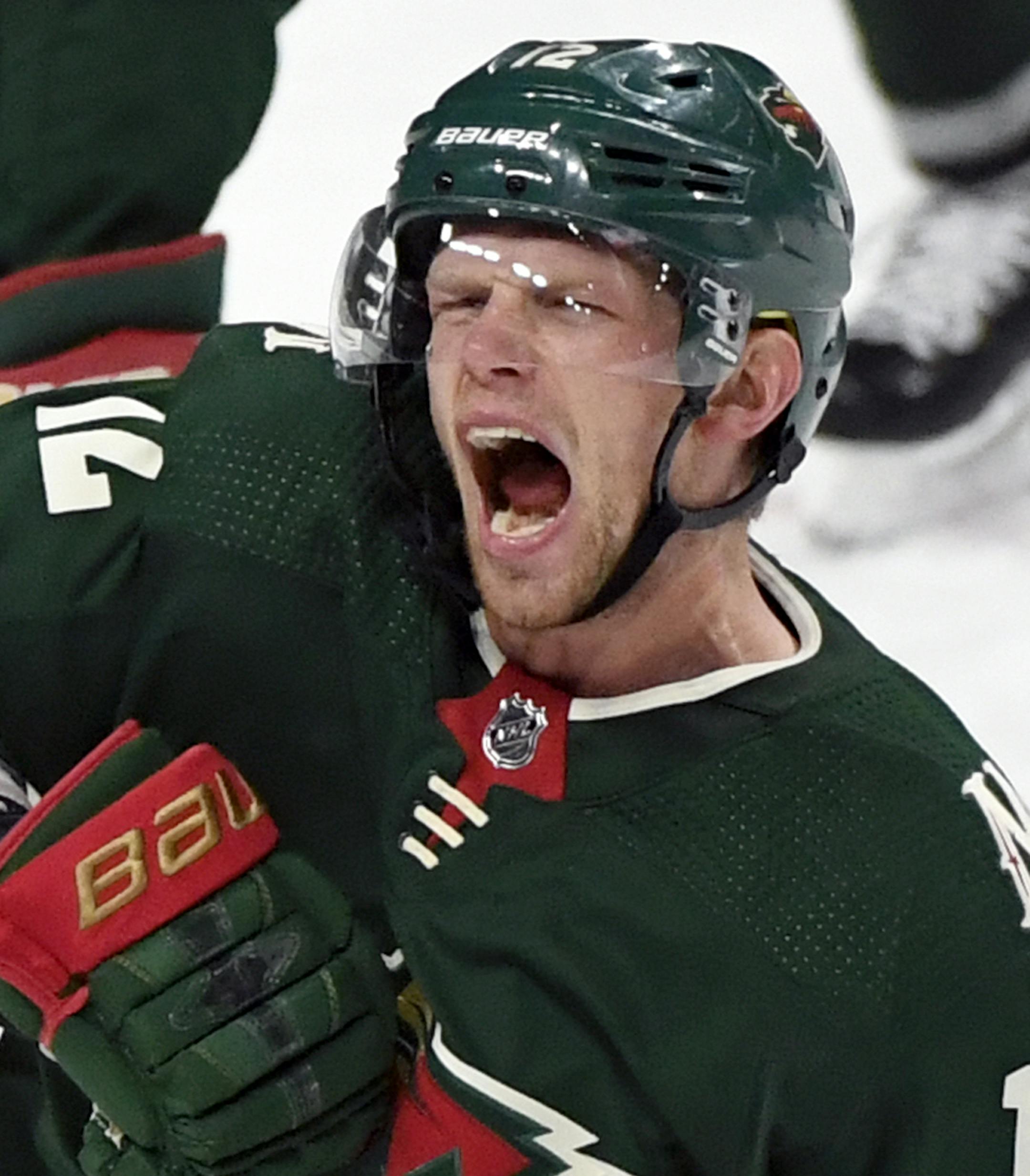 Minnesota Wild center Eric Staal (12) celebrates scoring against the Colorado Avalanche during the third period of an NHL hockey game Saturday, Oct. 27, 2018, in St. Paul, Minn. The Wild won 3-2. (AP Photo/Hannah Foslien)