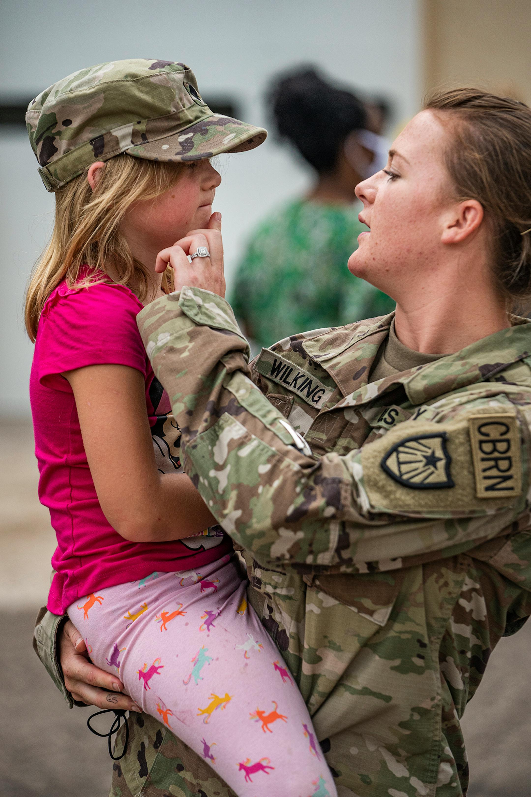 Specialist Kelli Wilking played with her niece Kaelynn Dorle, 6. Wilking will be deployed with her husband Sgt. Craig Wilking. They will be together for the year-long deployment.