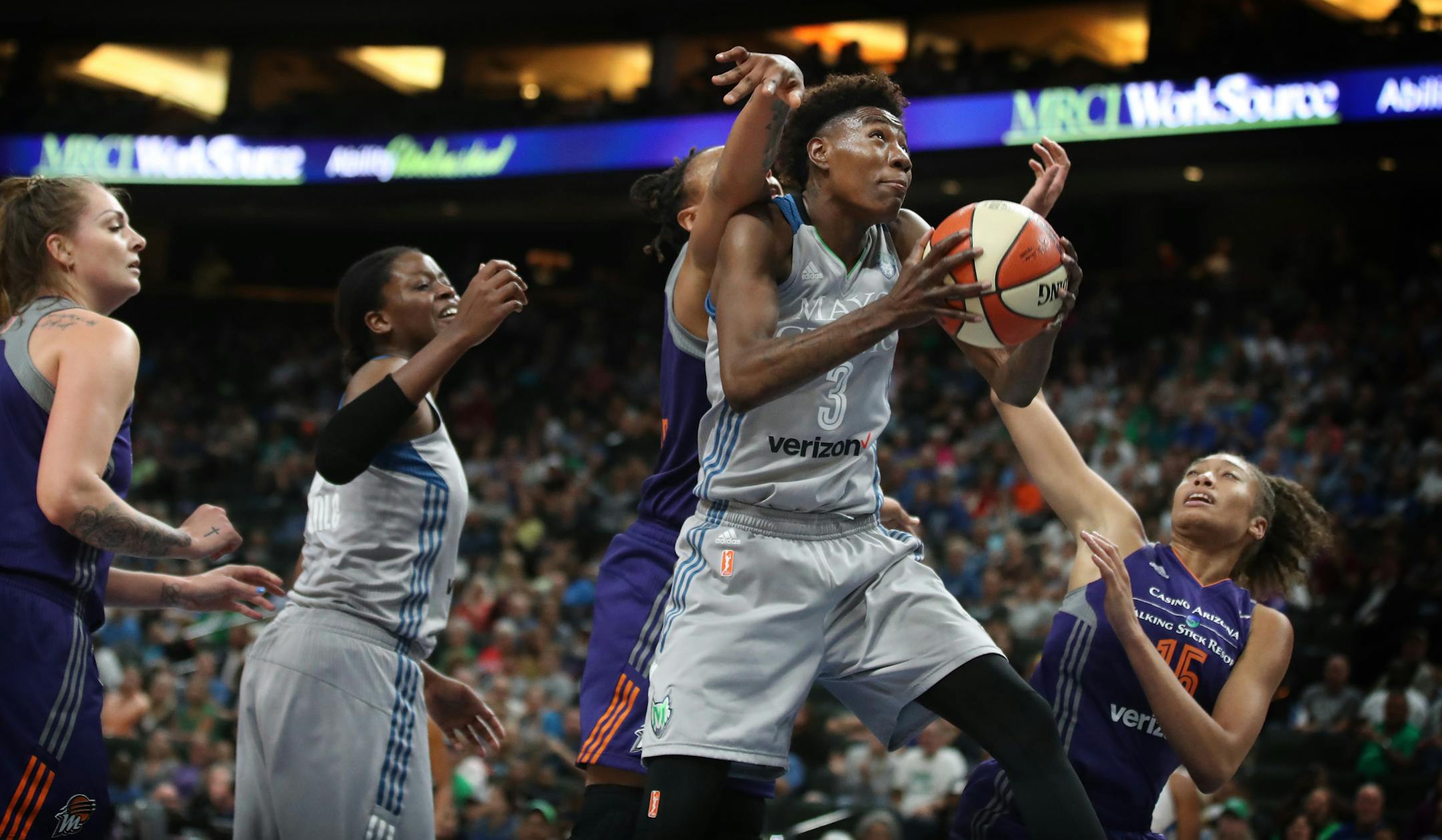Minnesota Lynx forward Natasha Howard (3) scored over Phoenix Mercury forward Emma Cannon (10), and guard Alexis Prince (15) in the second half at Xcel Energy Center on Tuesday August 22,2017 in St. Paul,MN.