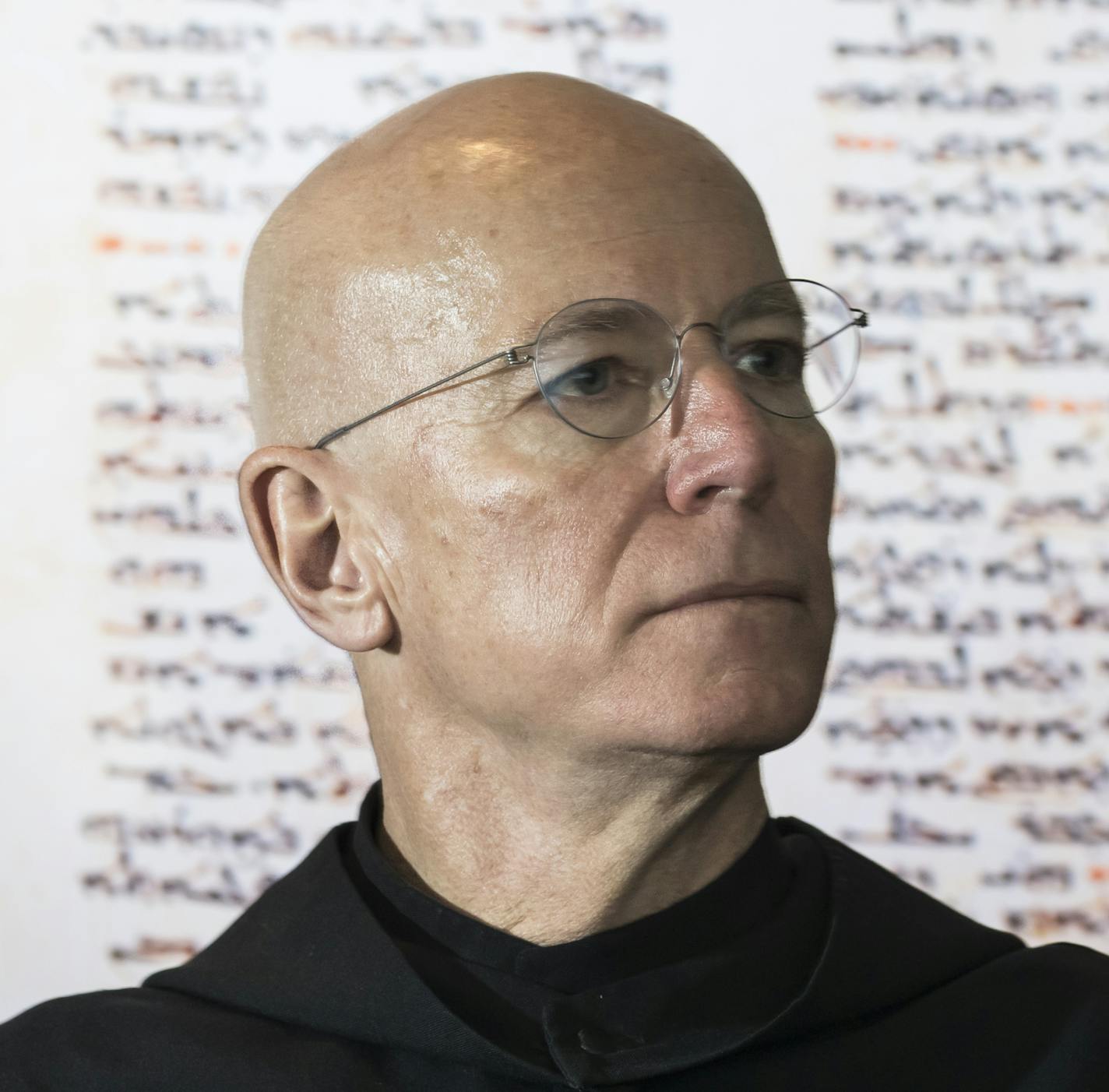 The Rev. Columba Stewart is racing worldwide to digitize sacred manuscripts before they are destroyed.