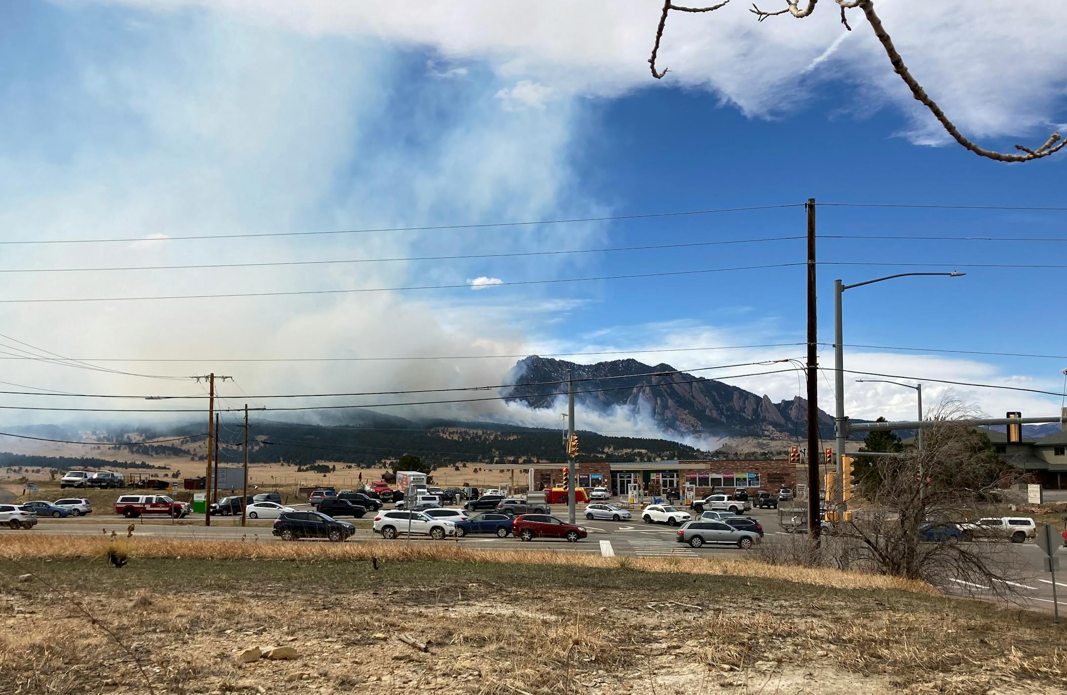 Smoke billowed from a wildfire Saturday, March 26, 2022 in Marshall, Colo. a few miles south of Boulder, Colo. About 1,200 Colorado residents have been ordered to evacuate due to a fast-moving wildfire near the site of a destructive 2021 blaze, Boulder police said Saturday. (AP Photo/Dave Zelio)