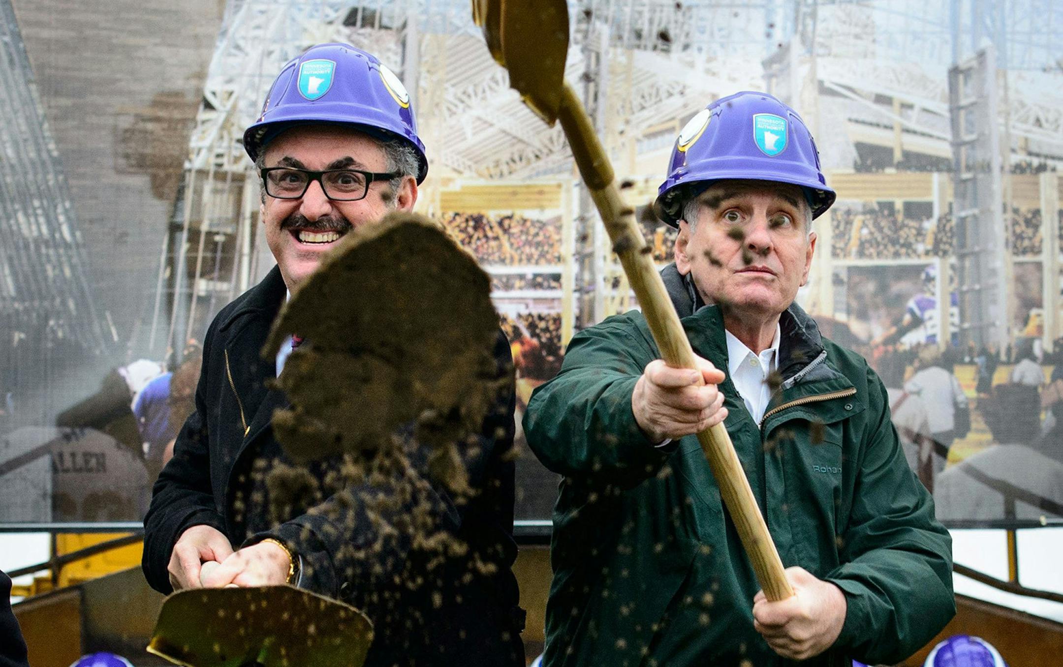 Minnesota Vikings owner Zygi Wilf, left, and Governor Mark Dayton shovel dirt at the groundbreaking ceremony outside the Metordome in Minneapolis on Tuesday, Dec. 3, 2013, as the team paves the way for a new home. (Glen Stubbe/Minneapolis Star Tribune/MCT) ORG XMIT: 1146334 ORG XMIT: MIN1312031923190471 ORG XMIT: MIN1312040924030671