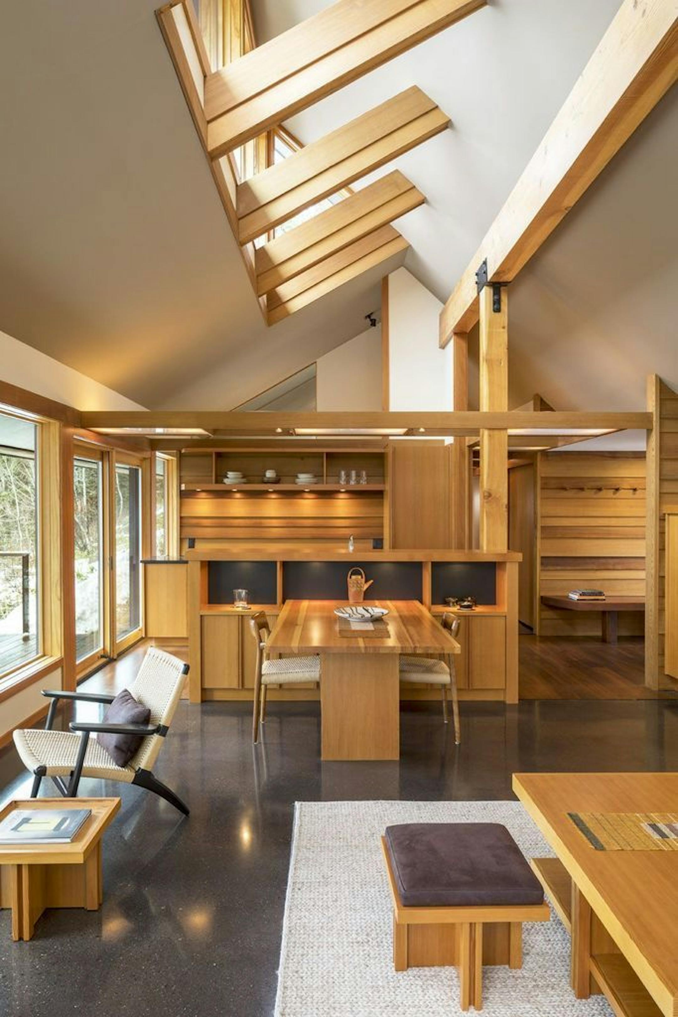 Clerestory windows on the lakeside draw in light from above.