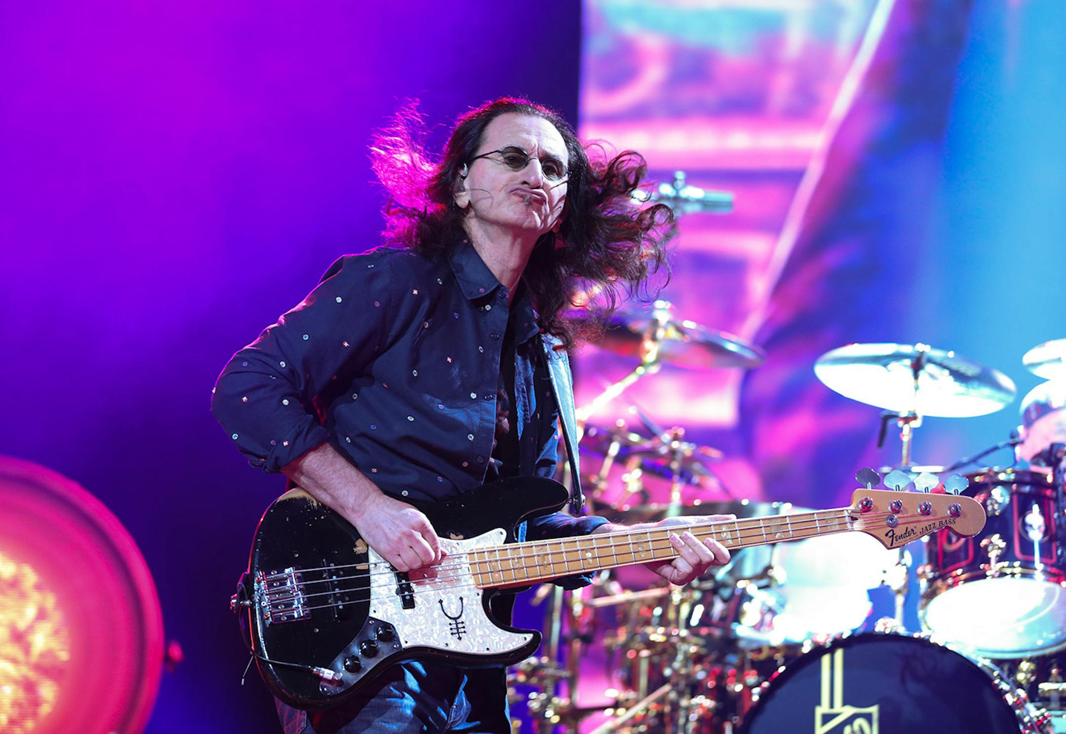 Rush bassist Geddy Lee worked the stage early in the band's first set Tuesday night. ] JEFF WHEELER ï jeff.wheeler@startribune.com Canadian rock gods Rush performed at Xcel Energy Center in St. Paul, Tuesday night, May 12, 2015.