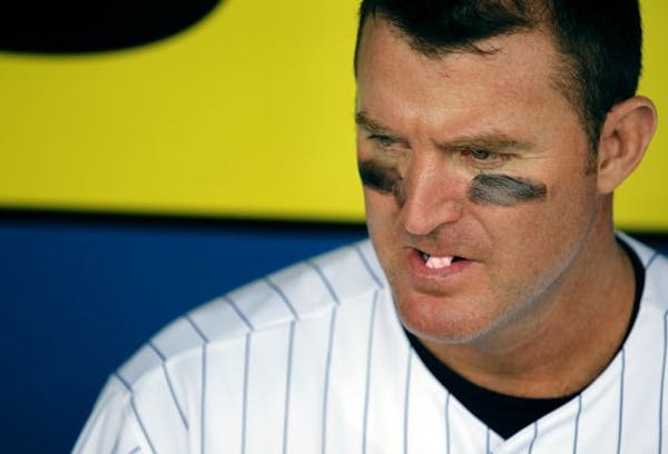 Jim Thome chewed gum as he sat in the dugout before Tuesday's game.