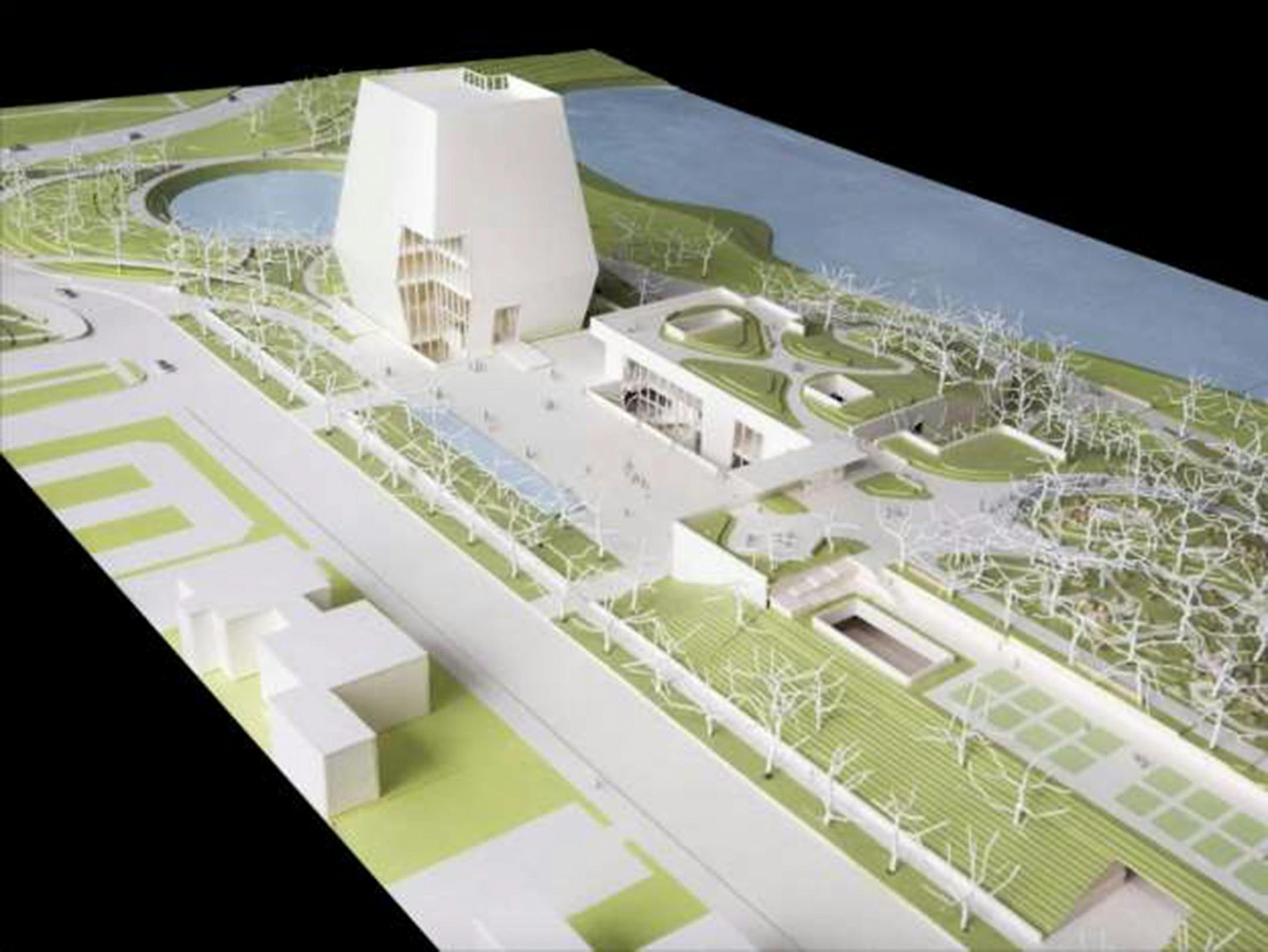 A model showing a view of the Obama Presidential Center looking north shows the Museum, Forum and Library. The Museum, the tallest structure on site, will serve as serve as a lantern for the Obama Presidential Center. The Library and Forum are single story structures with planted terraces.