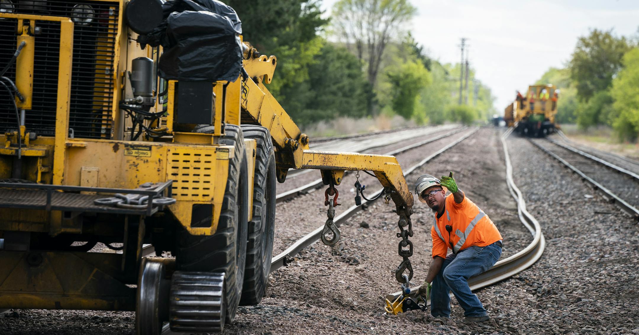 Workers unload and place rail segments for the Southwest Light Rail project on the railroad tracks near the future Beltline Boulevard Station in St. Louis Park. ] LEILA NAVIDI &#xa5; leila.navidi@startribune.com BACKGROUND INFORMATION: Construction begins on the Southwest Light Rail project on the railroad tracks at the future Beltline Boulevard Station in St. Louis Park on Monday, May 13, 2019.