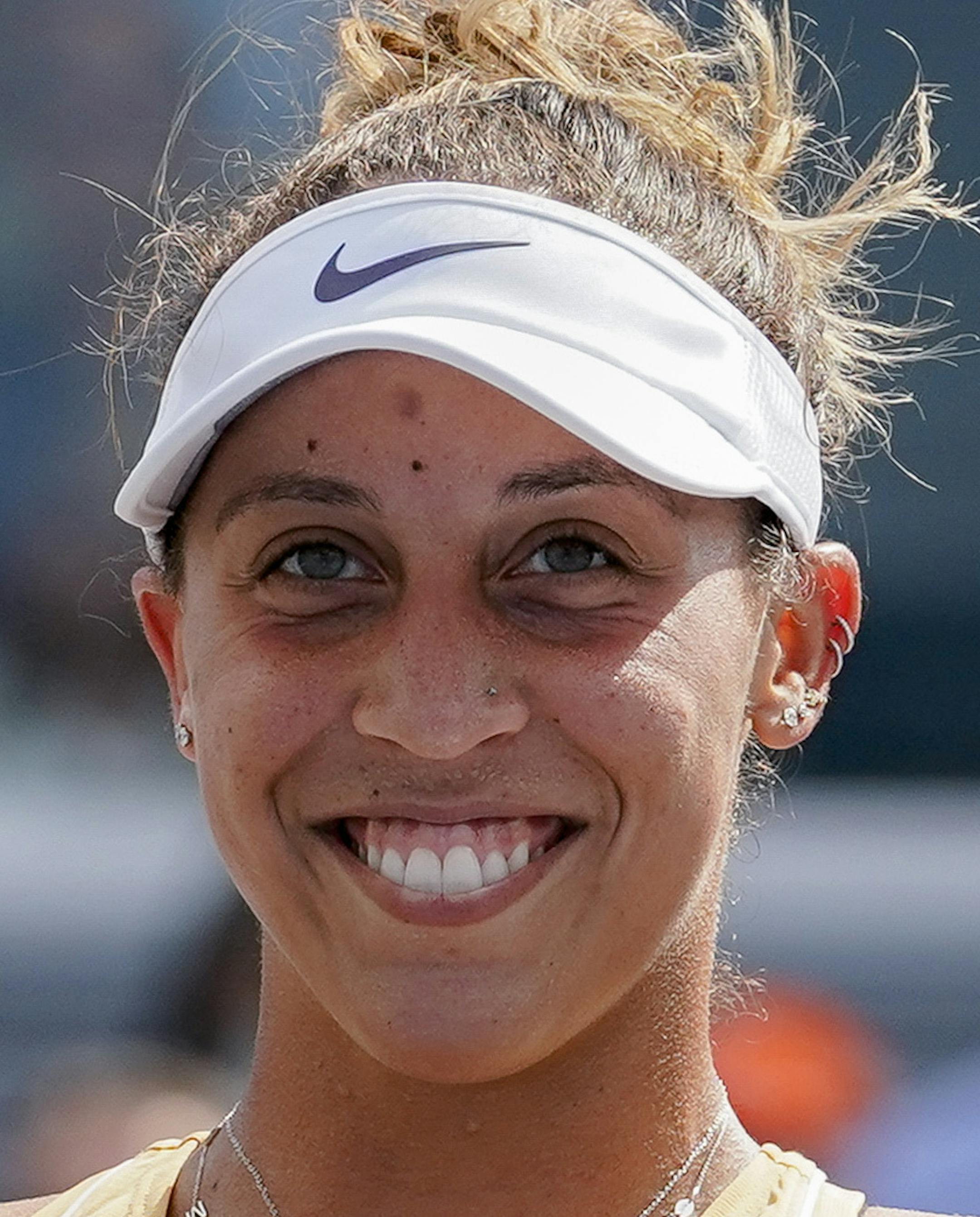 FILE - In this Aug. 18, 2019, file photo, Madison Keys, of the United States, holds the Rookwood Cup after defeating Svetlana Kuznetsova, of Russia, in the women's final match during the Western & Southern Open tennis tournament in Mason, Ohio. Keys, still just 24, was the U.S. Open runner-up in 2017 and heads into this year’s tournament off the success of a hard-court title in Mason, Ohio. She is one of a group of promising young Americans in tennis. (AP Photo/John Minchillo, File)