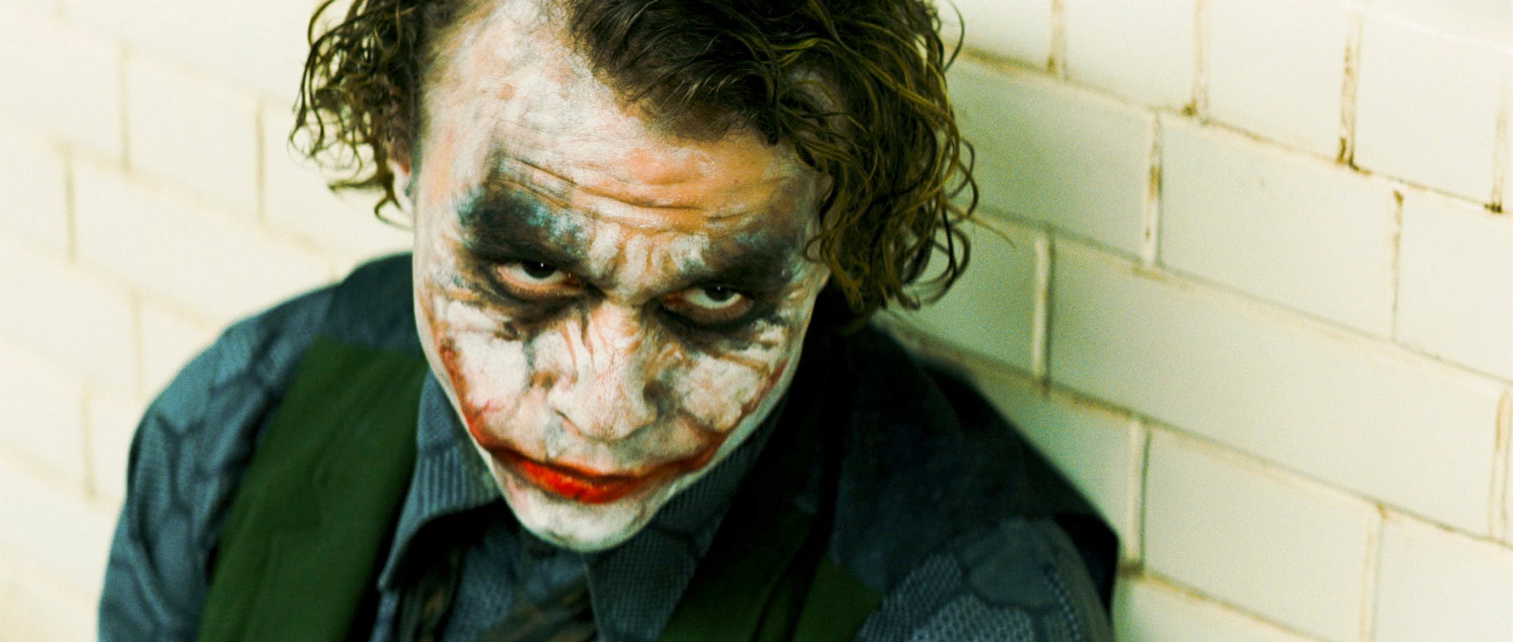 HEATH LEDGER stars as The Joker