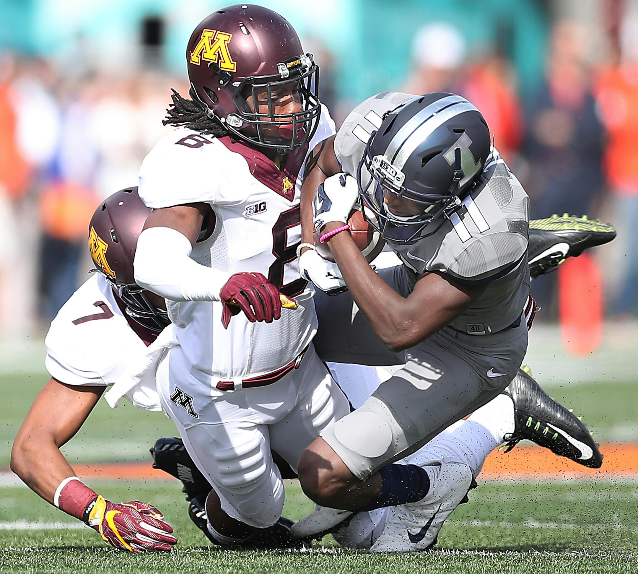 Minnesota's defensive back Duke McGhee tackled Illinois wide receiver Malik Turner which led to his ejection from the game during the first quarter as Minnesota took on Illinois at Memorial Stadium, Saturday, October 29, 2016 in Champaign, IL. ] (ELIZABETH FLORES/STAR TRIBUNE) ELIZABETH FLORES &#x2022; eflores@startribune.com