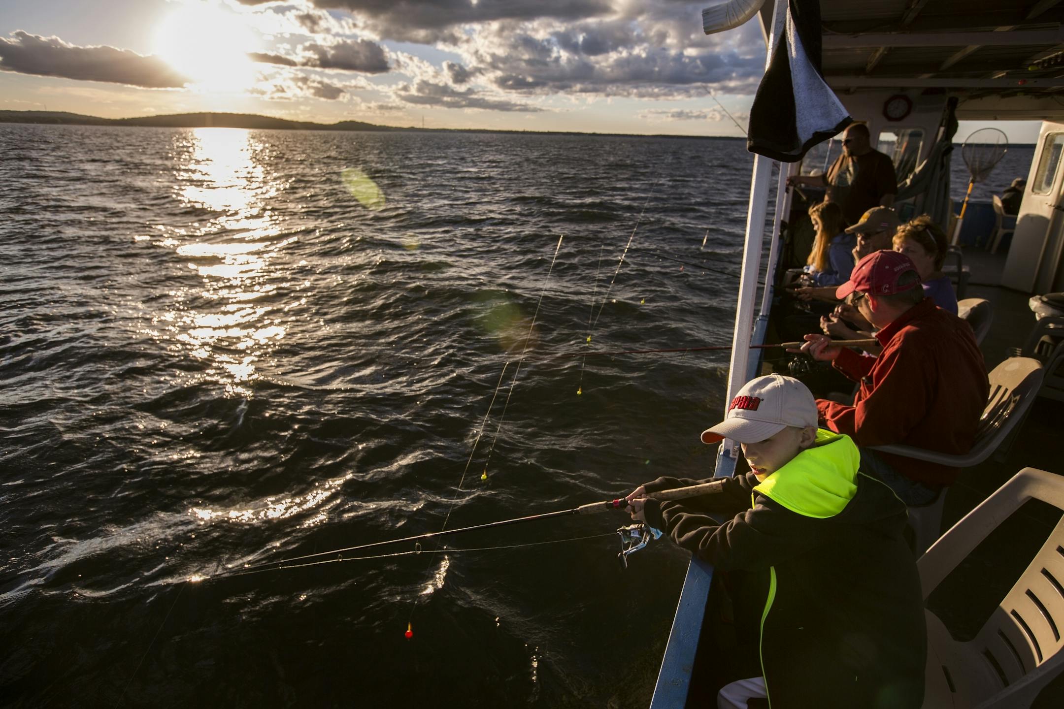 Wyatt Peterson, 10, of Excelsior fishes during a fishing expedition with Twin Pines Resort on Mille Lacs Lake Monday, August 3, 2015.