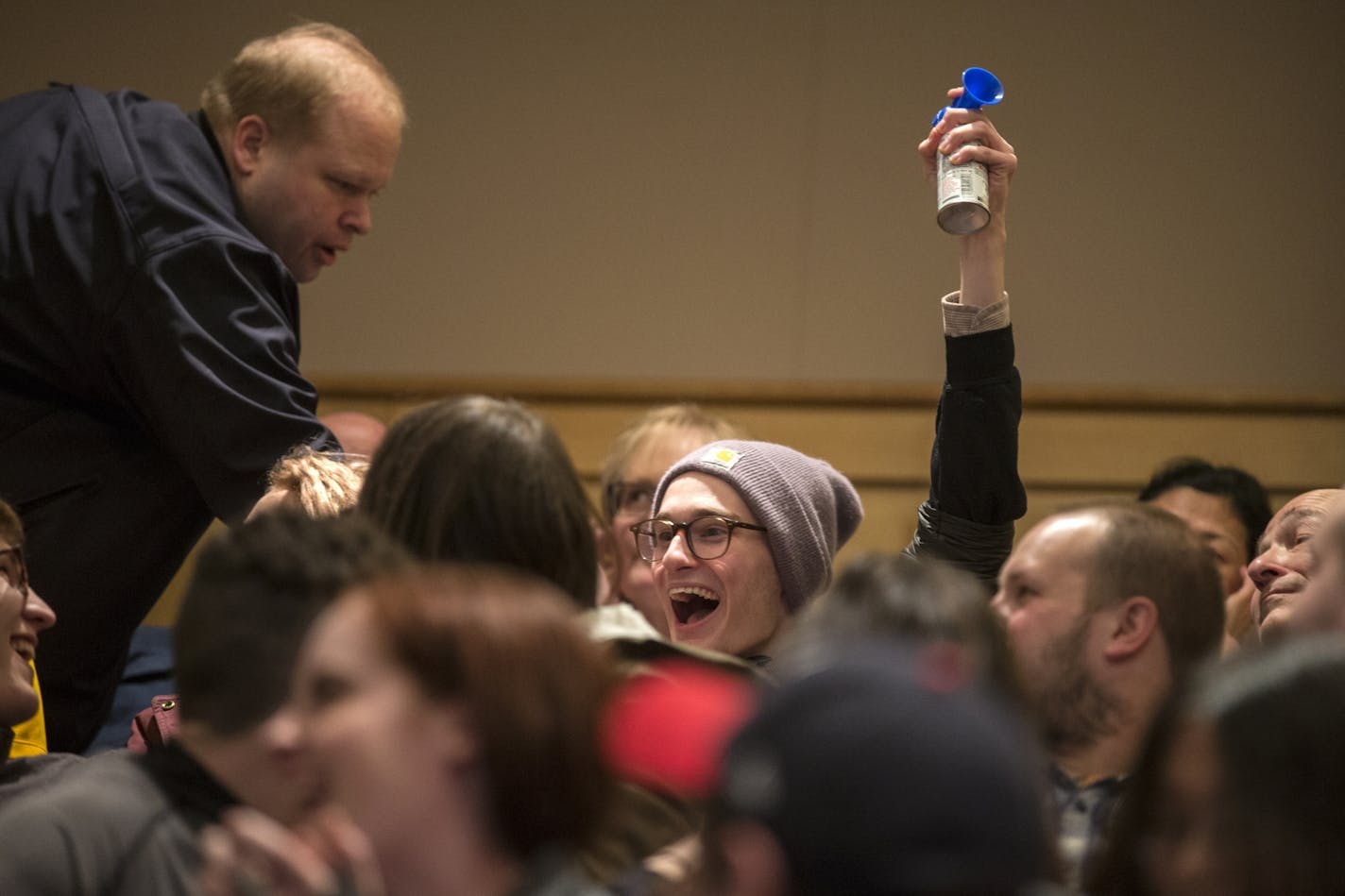 A protester interrupts with a blow horn during a talk by Milo Yiannopoulos and Christina Hoff Sommers at the Humphrey Institute of Public Affairs on the campus of the University of Minnesota in Minneapolis on Wednesday, February 17, 2016. The protester was escorted out.