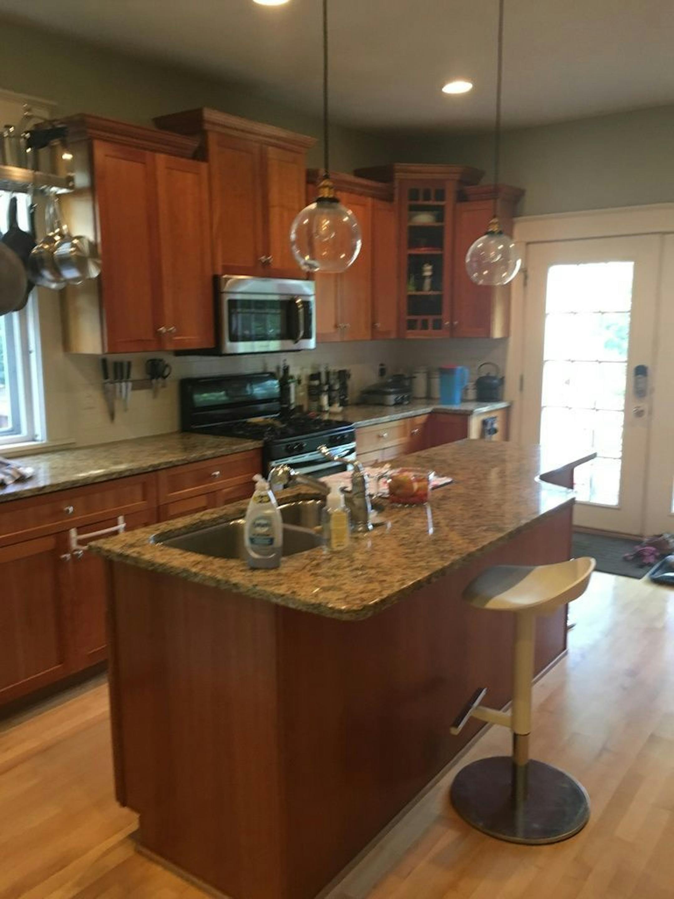 BEFORE: The kitchen was dark and drafty and didn't match the character of the house.