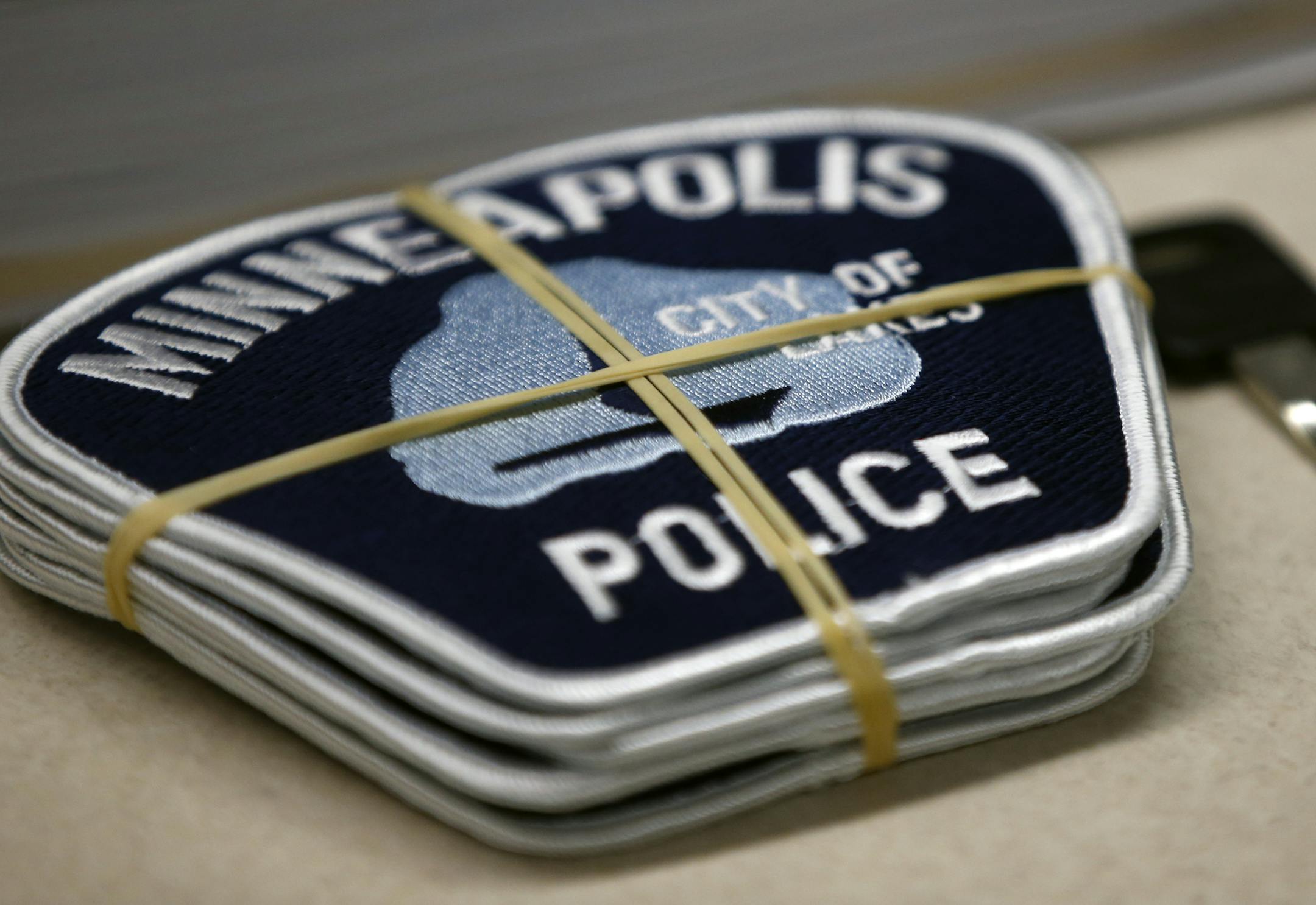 In North Minneapolis the first day of police training academy is being set in motion with the latest crop of cadets, 27. Minneapolis Sgt. Each cadet gets a set of eight badges.] Richard Tsong-Taatarii/rtsong-taatarii@startribune.com