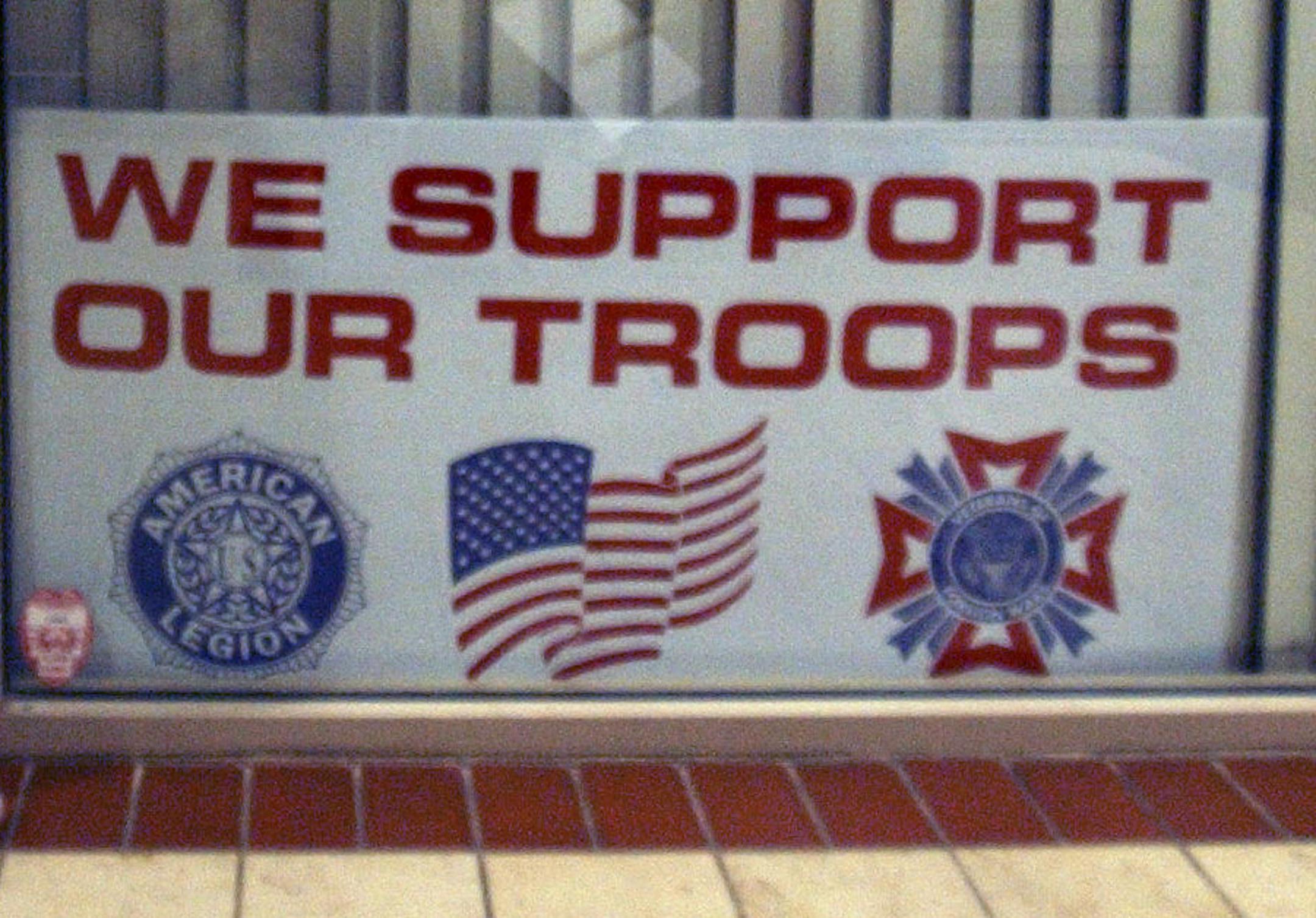 JOEY MCLEISTER ¬• jmcleister@startribune.com St. Paul,Mn.,Thurs.,Jan. 11, 2007--The Pellant family took their signs reading, "Let my dad come home. He's served long enough!" to Sen. Norm Coleman's office where they had heard there was a rally against the troop increase and service extension. Nine-year-old Ruby Pellant held her sign against the glass. (They got to the protest early) Chief Warrant Officer Ron-Michael (cq.) Pellant was scheduled to come home in three months, but his sta