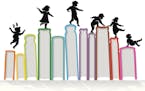 iStockphoto.com
Children silhouette on top of upright books.