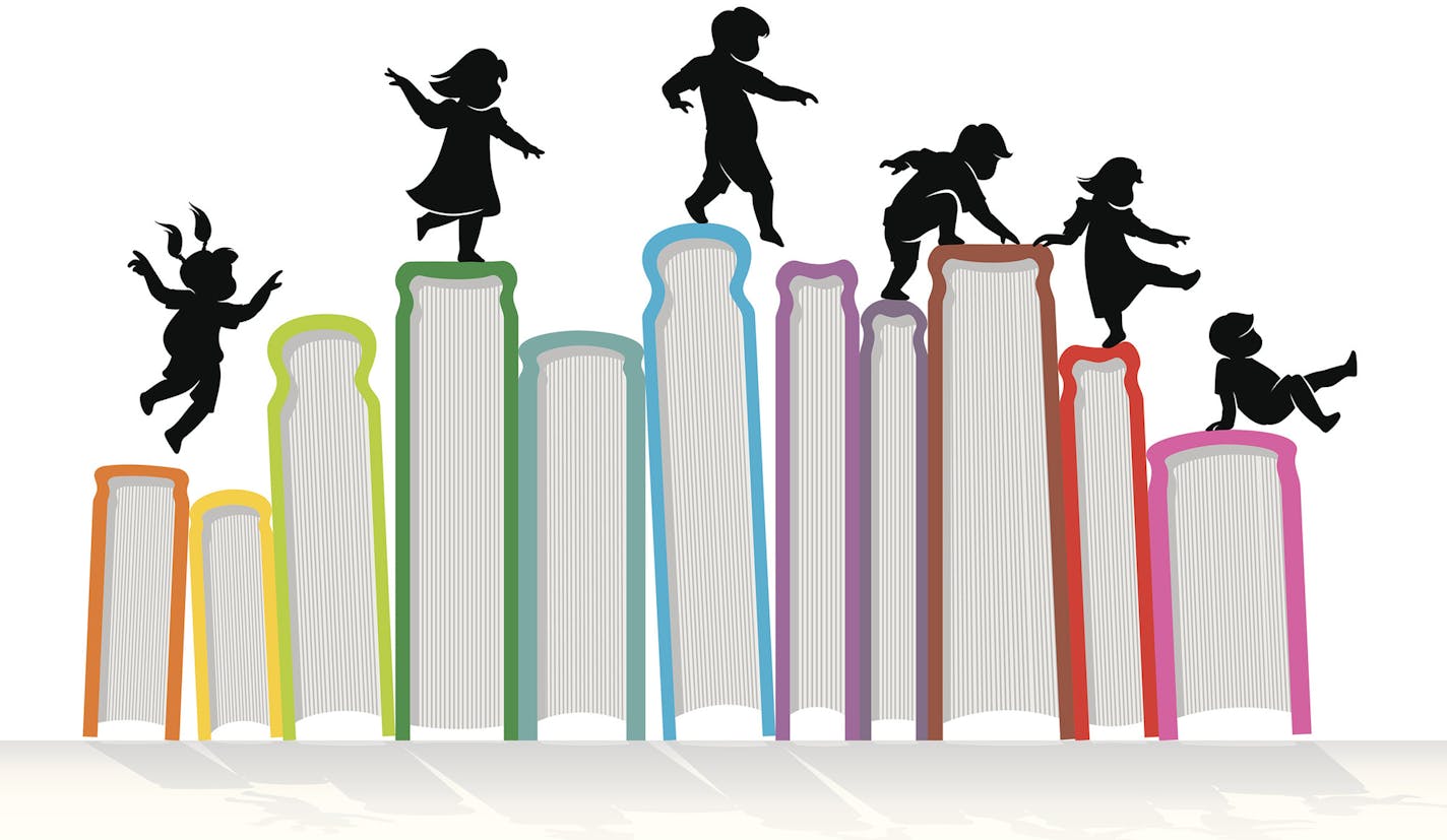 iStockphoto.com
Children silhouette on top of upright books.