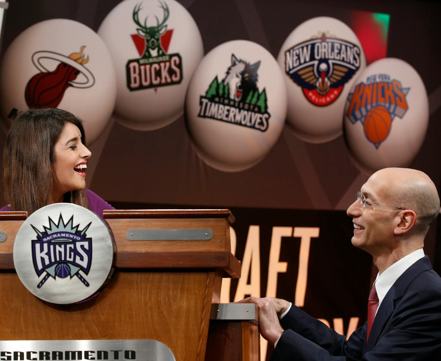 Anjali Ranadive, left, daughter of Sacramento Kings owner Vivek Ranadive, chats with NBA Commissioner Adam Silver before the NBA basketball draft lottery in New York, Tuesday, May 20, 2014.