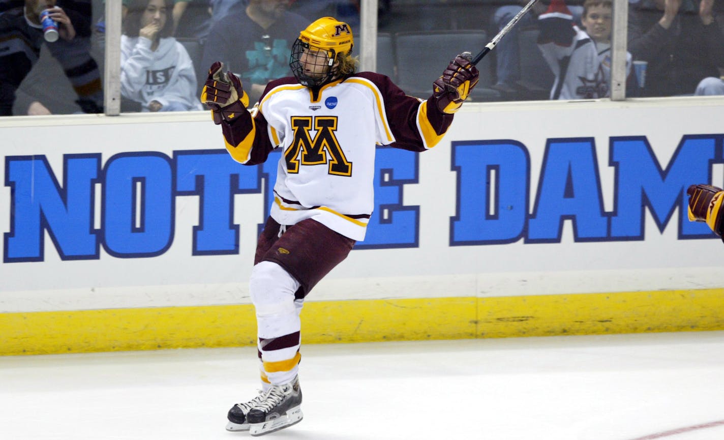 Richard Tsong-Taatarii Star Tribune Grand Rapids, MI;3/27/04;left to right: In the midwest regionals, U of M player Thomas Vanek celebrates his second goal of the game against ND making the score 4-2 in the third period.