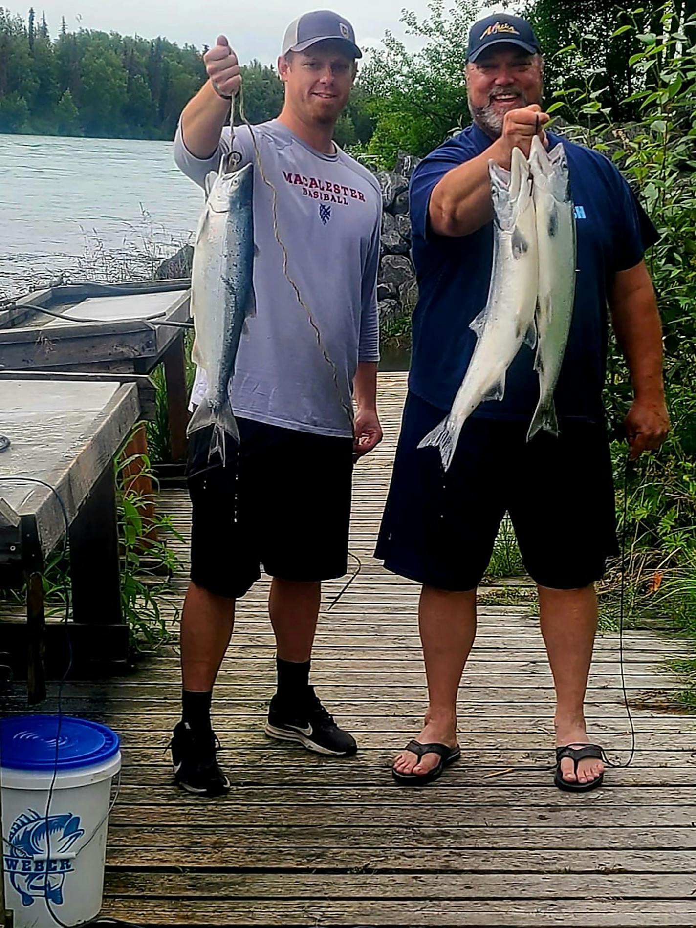 Donn Weber, right, with his son, Graig, sharing a day's catch.