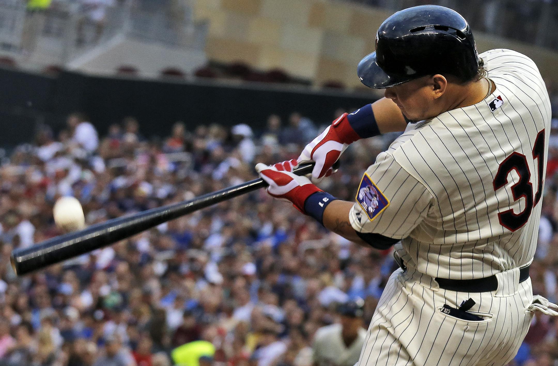 Twins Oswaldo Arcia knocked a Brewer pitch into the right field stands to give the Twins a 3-1 lead in the 4th inning. ] Minnesota Twins vs. Milwaukee Brewers. (MARLIN LEVISON/STARTRIBUNE(mlevison@startribune.com)