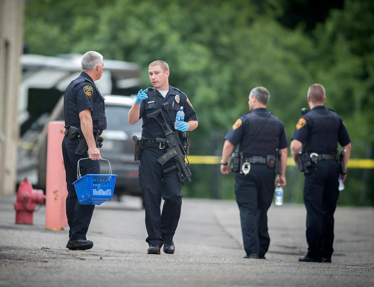 Police investigate the scene of a shooting at the 2800 block of Hedberg Drive near a storage facility, Friday, June 23,2017 in Minnetonka