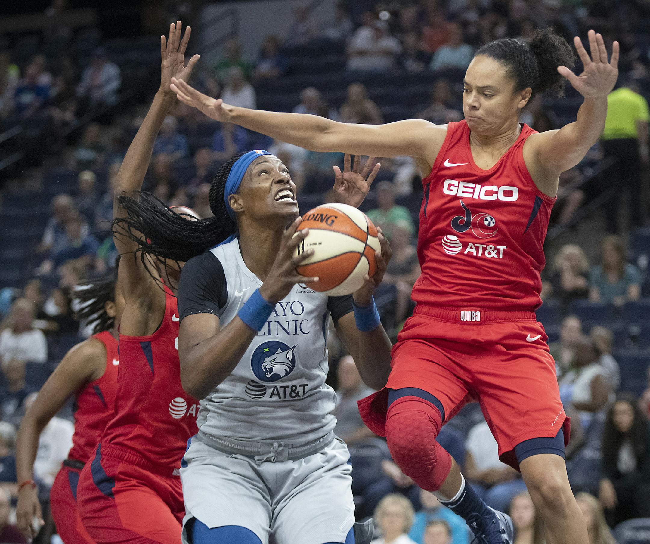 Minnesota Lynx Sylvia Fowles went to the basket for two defended by the Mystics' Kristi Toliver during the first quarter as the Lynx took on the Washington Mystics, Wednesday, July 24, 2019 at the Target Center in Minneapolis, MN. ] ELIZABETH FLORES • liz.flores@startribune.com
