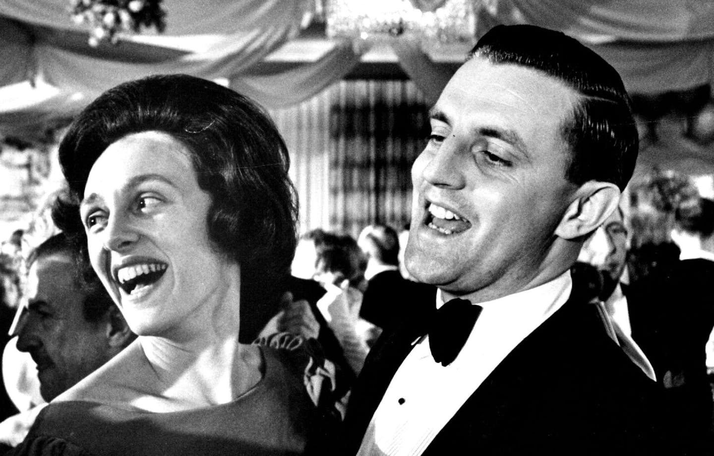 January 21, 1965 Sen. and Mrs. Walter Mondale, newcomers among Minnesota "regulars" in Washington, had a fine time at the ball. Mrs. Mondale wore a red silk gown with sleeves of puckered velvet. Their biggest thrill among many that week was lunching with the presidential party immediately after the inaugural ceremonies on Capitol Hill.