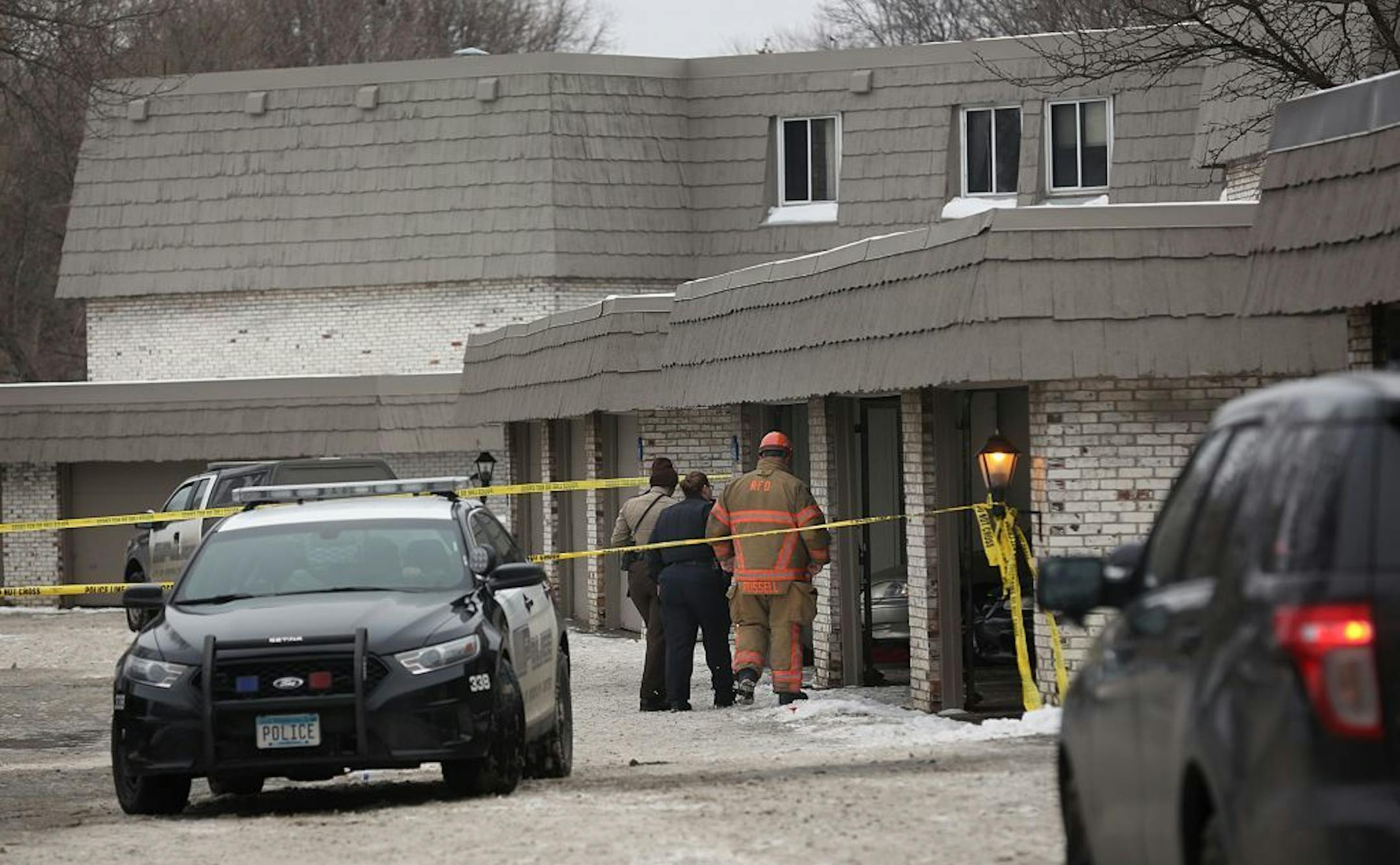 Fire and law enforcement personal entered an apartment building in Brooklyn Center where a 2-year-old child was killed.