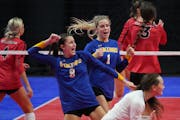 Minneota's Elvira Faris celebrates a point against Mayer Lutheran on Saturday. The Vikings won the Class 1A title.