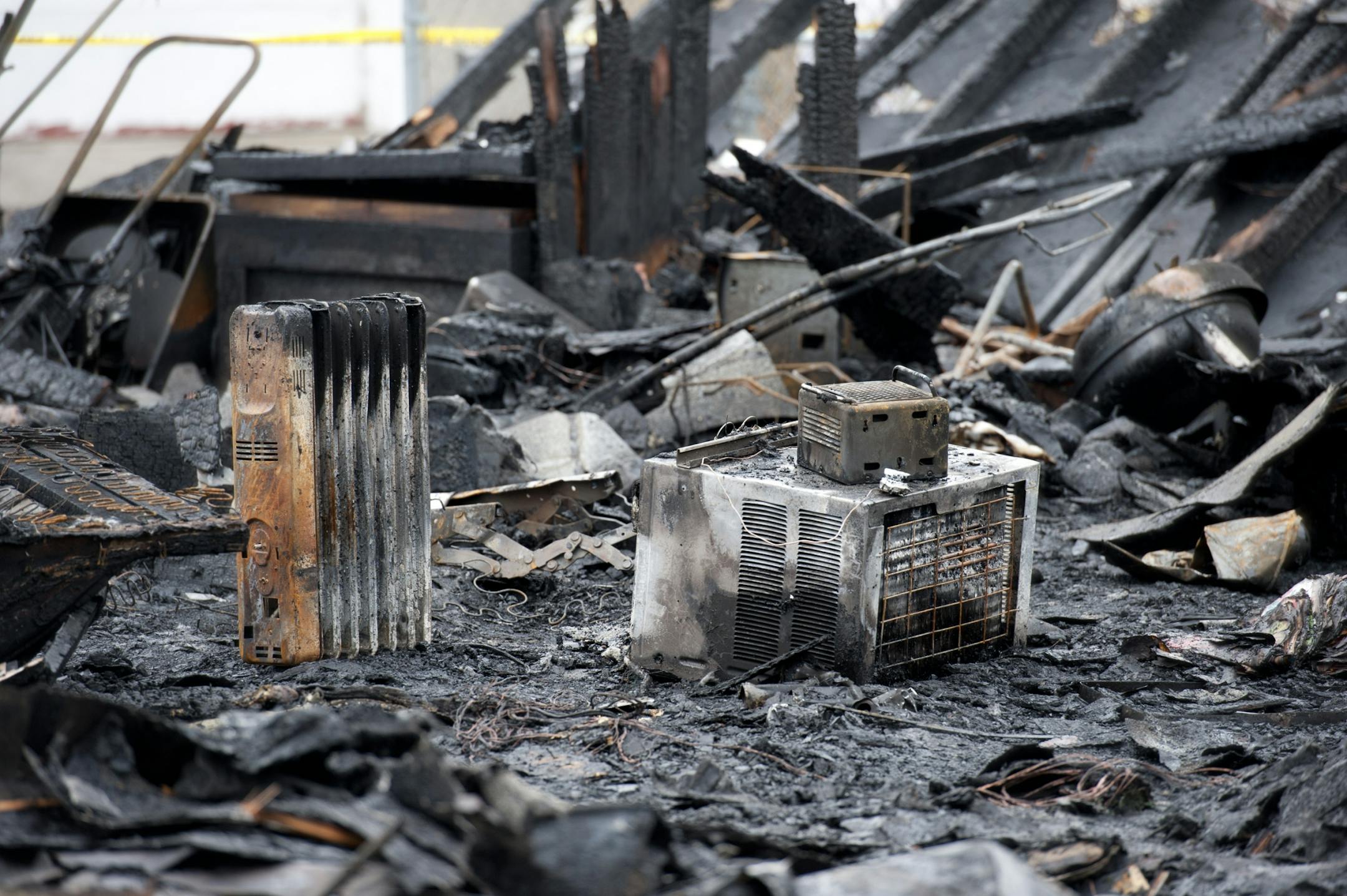 Some burned out space heaters in the garage where Donald Pnewski died in an early morning fire in the 800 block of Juno Avenue, St. Paul, Thursday, March 22, 2012.