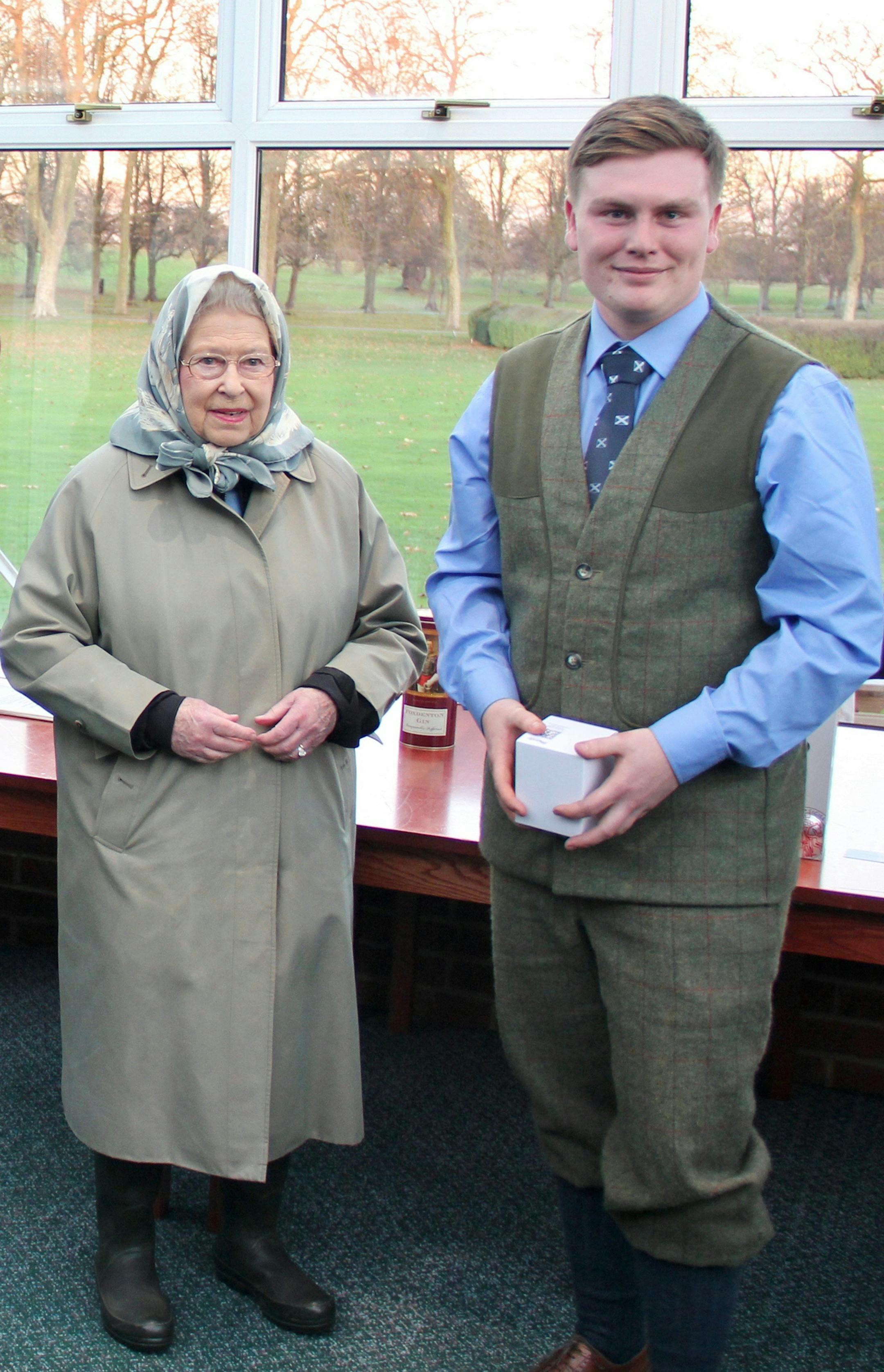 Scotsman David Logan with Queen Elizabeth II at a shoot and retriever field trial held at Windsor Great Park in 2016 in honor of the Queen's 90th birthday. At this shoot, the Queen invited game keepers and other help from her estates throughout Britain to be the guns. Logan's dog was awarded Gun's Choice by the Queen ó meaning it was the event's best dog, as voted by the guns.