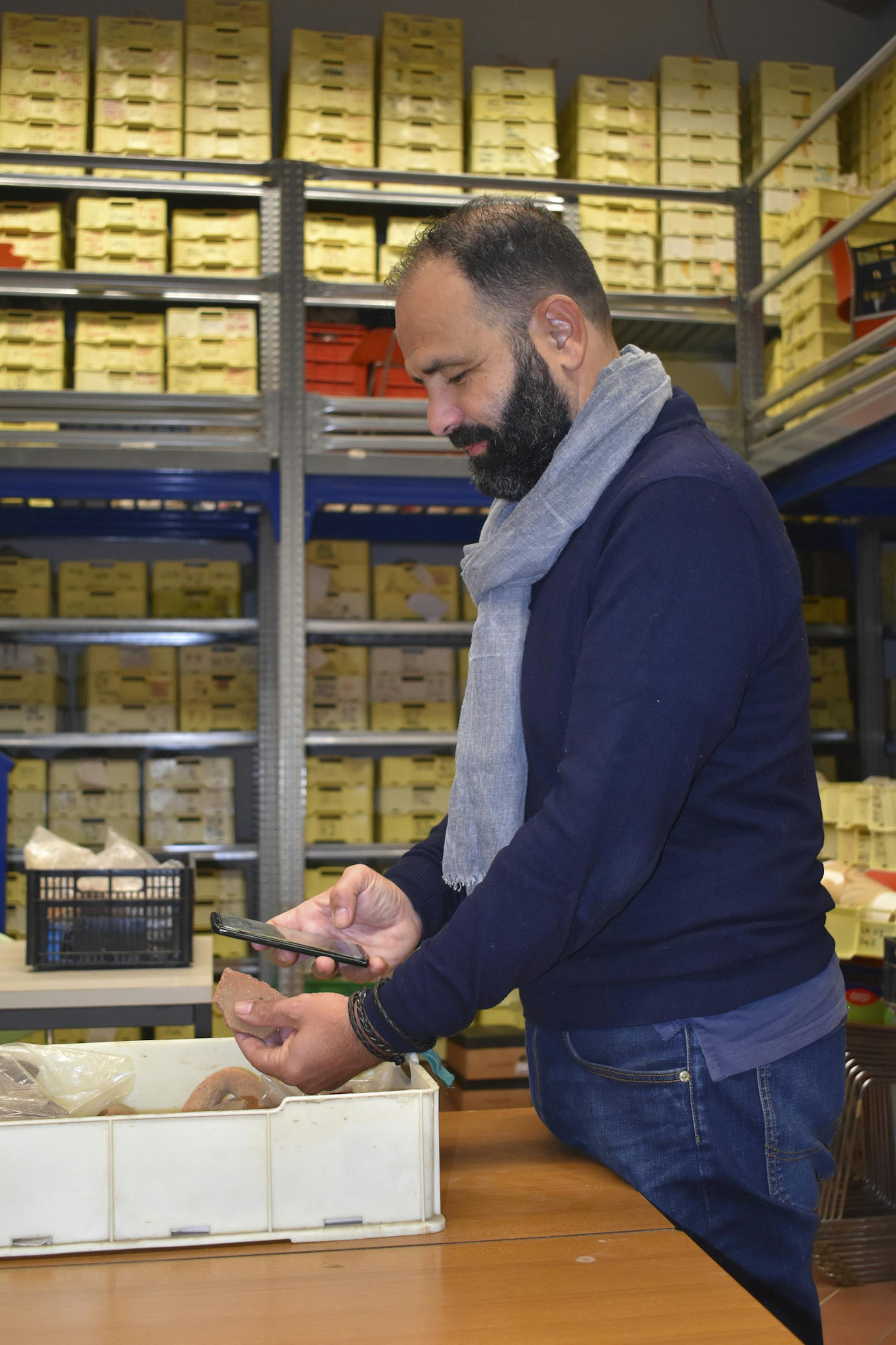 **EMBARGO: No electronic distribution, Web posting or street sales before 3:01 a.m. ET Tuesday, Nov. 24, 2020. No exceptions for any reasons. EMBARGO set by source.** In an undated photo from MPPALab - University of Pisa, Gabriele Gattiglia with bits of clay pottery. He had spent hours mapping burials using Google Earth images of territory in what is now Russia, Mongolia and Western China's Xinjiang province. (MAPPALab - University of Pisa via The New York Times) -- NO SALES; FOR EDITORIAL USE O