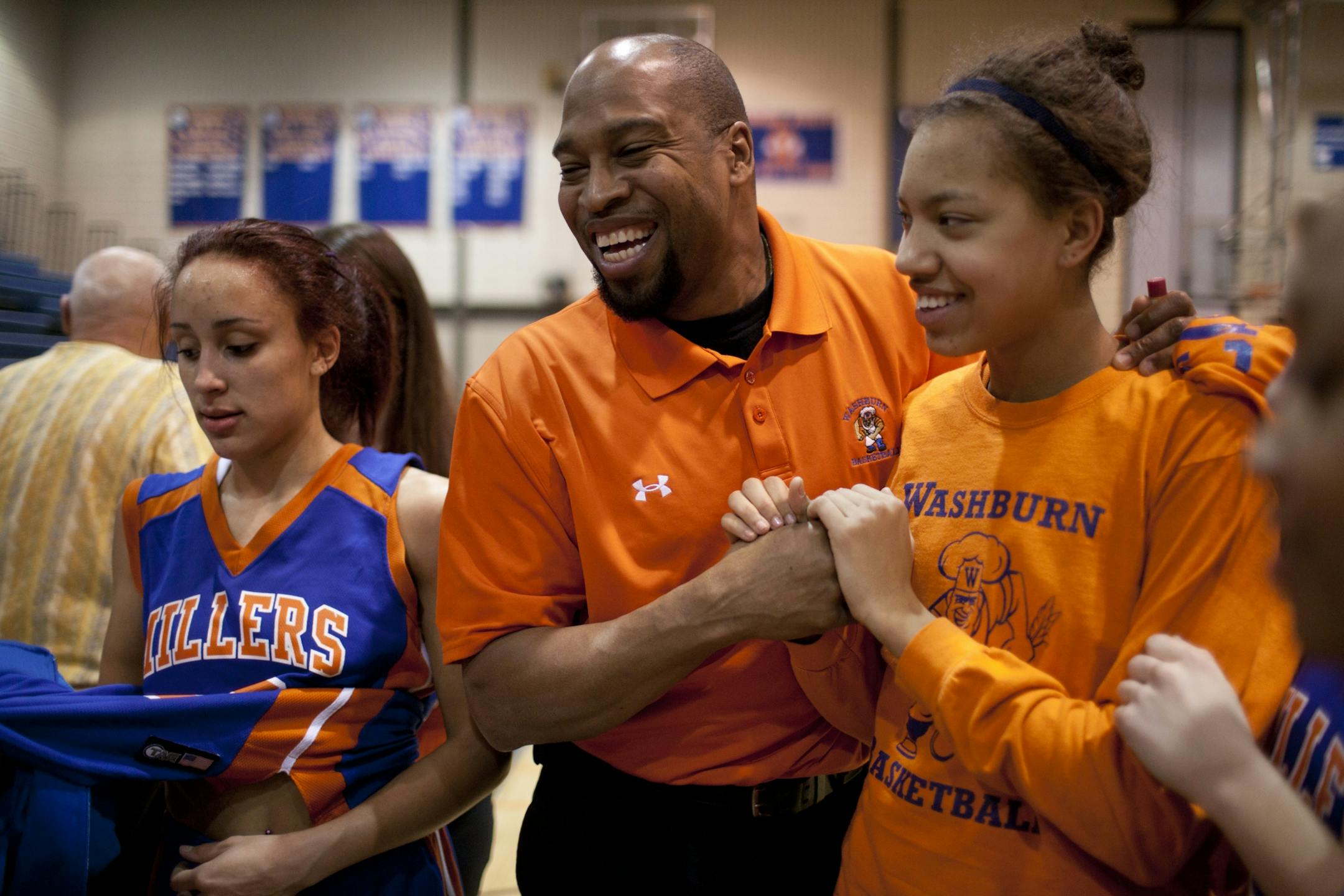 Chase Coley, right, and her dad, Tylor, in happier times this season after Washburn's victory over Edison last Wednesday. The death of Chase's mother and Tylor's wife in November of 2010 was a tragic time, but the family's favorite sport has helped bring joy back to their lives. "Basketball is a good distraction," Chase Coley said. "It helps to be together."