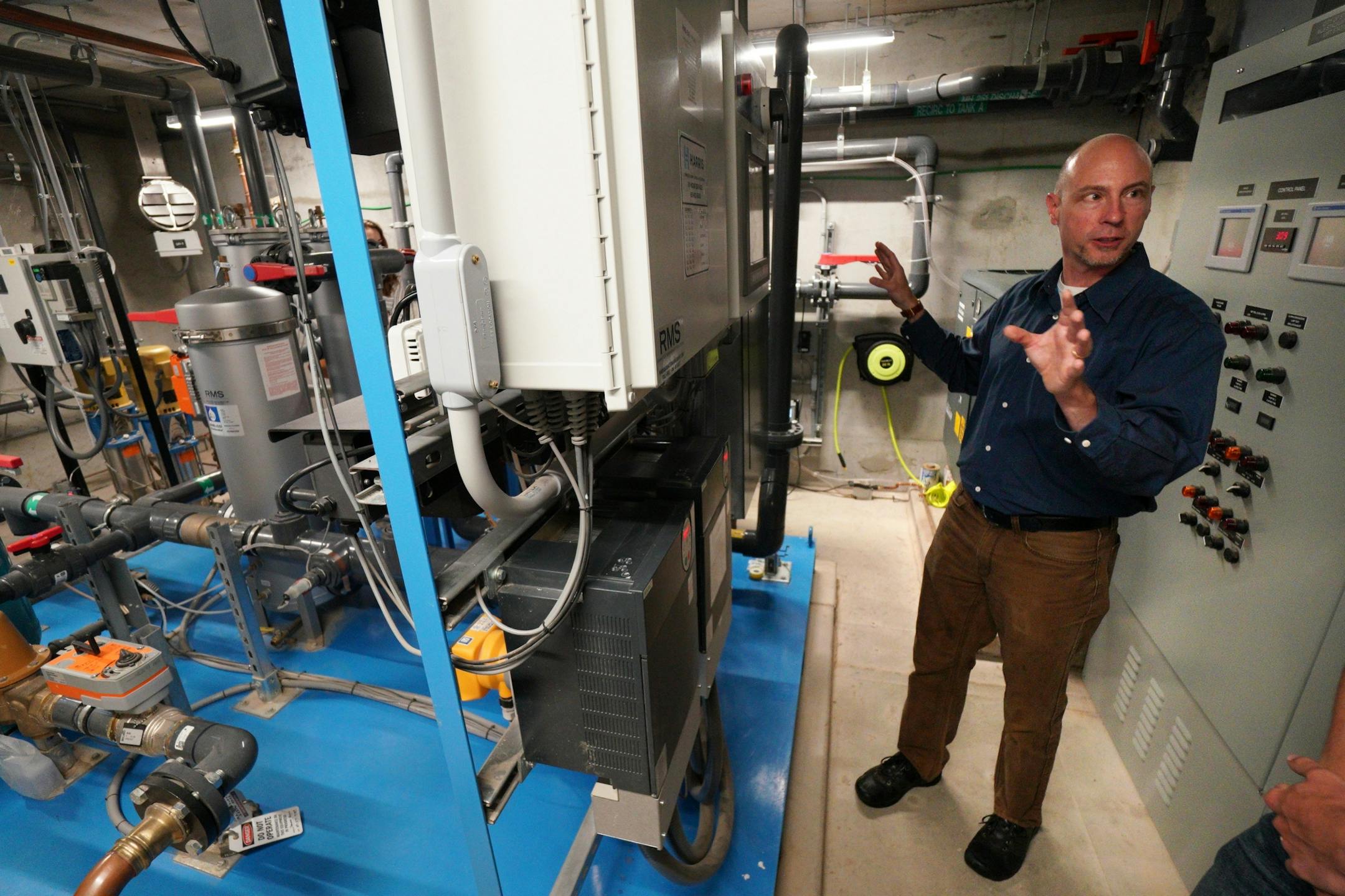 The City of Saint Paul and Minnesota United unveiled their new cutting-edge rainwater reuse system, complete with water harvesting process and tree-trench irrigation system. Here, Wes Saunders-Pearce described the heart of the filter and irrigation system under the great lawn.