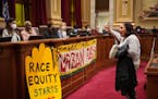 Nicole Perez, a resident of Little Earth, pleaded with Minneapolis City Council members on behalf of her granddaughter who has asthma in opposition to