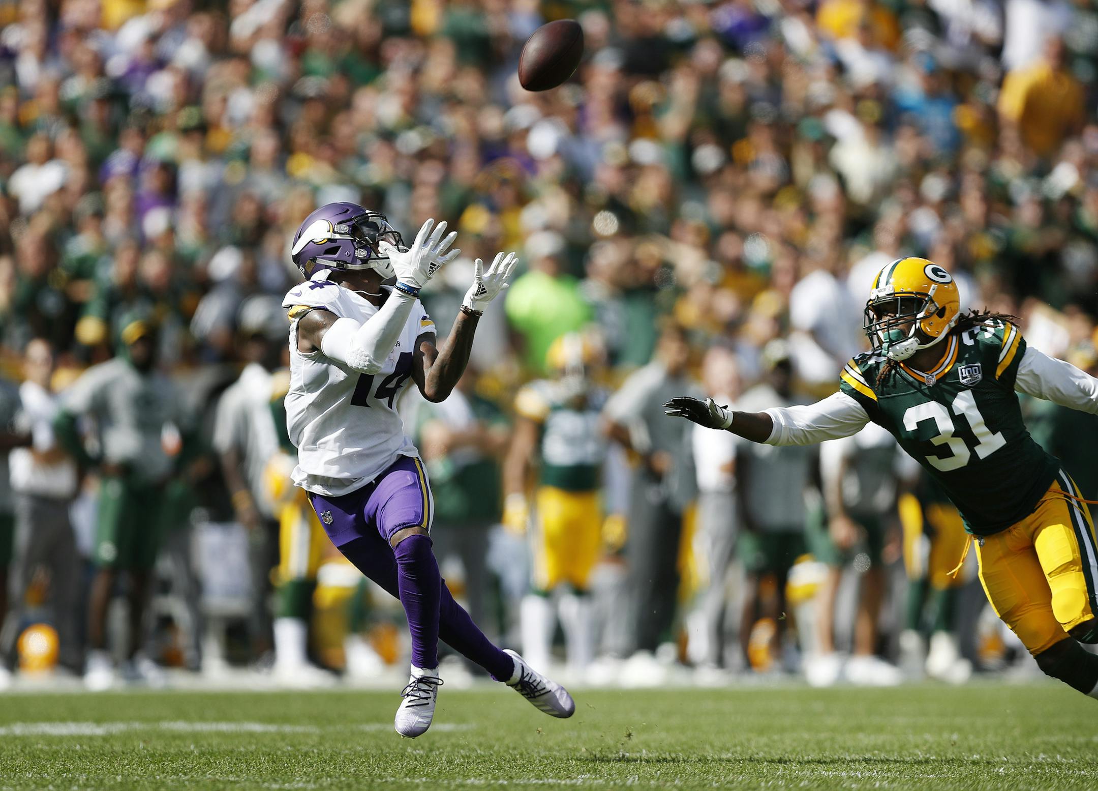 Minnesota Vikings wide receiver Stefon Diggs (14) caught 75 yard touchdown over Green Bay Packers defensive back Davon House (31) in the forth quarter Sunday September 16, 2018 in Green Bay, WI. ] JERRY HOLT ï jerry.holt@startribune.com.