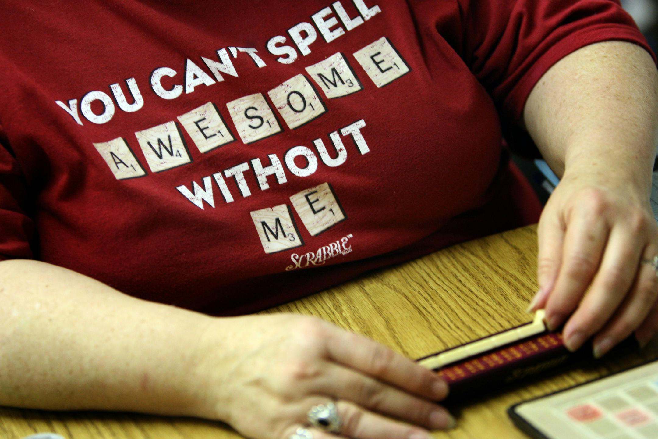 Carol Dustin's shirt showed her enthusiasm for Scrabble at The Twin City Bridge Center in Minneapolis.