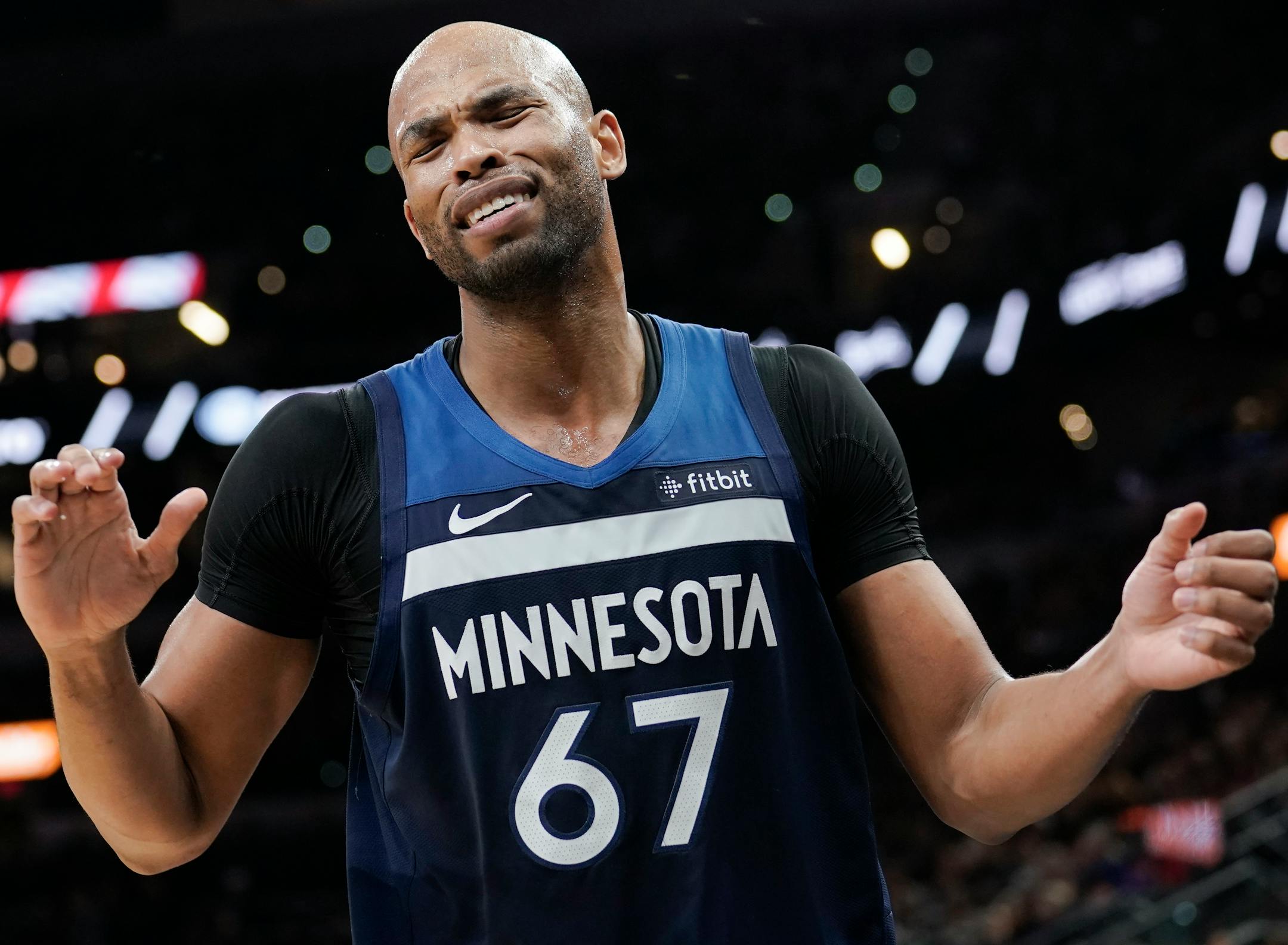 Minnesota Timberwolves' Taj Gibson reacts after being called for a foul during the second half of an NBA basketball game against the San Antonio Spurs, Friday, Dec. 21, 2018, in San Antonio. (AP Photo/Darren Abate)