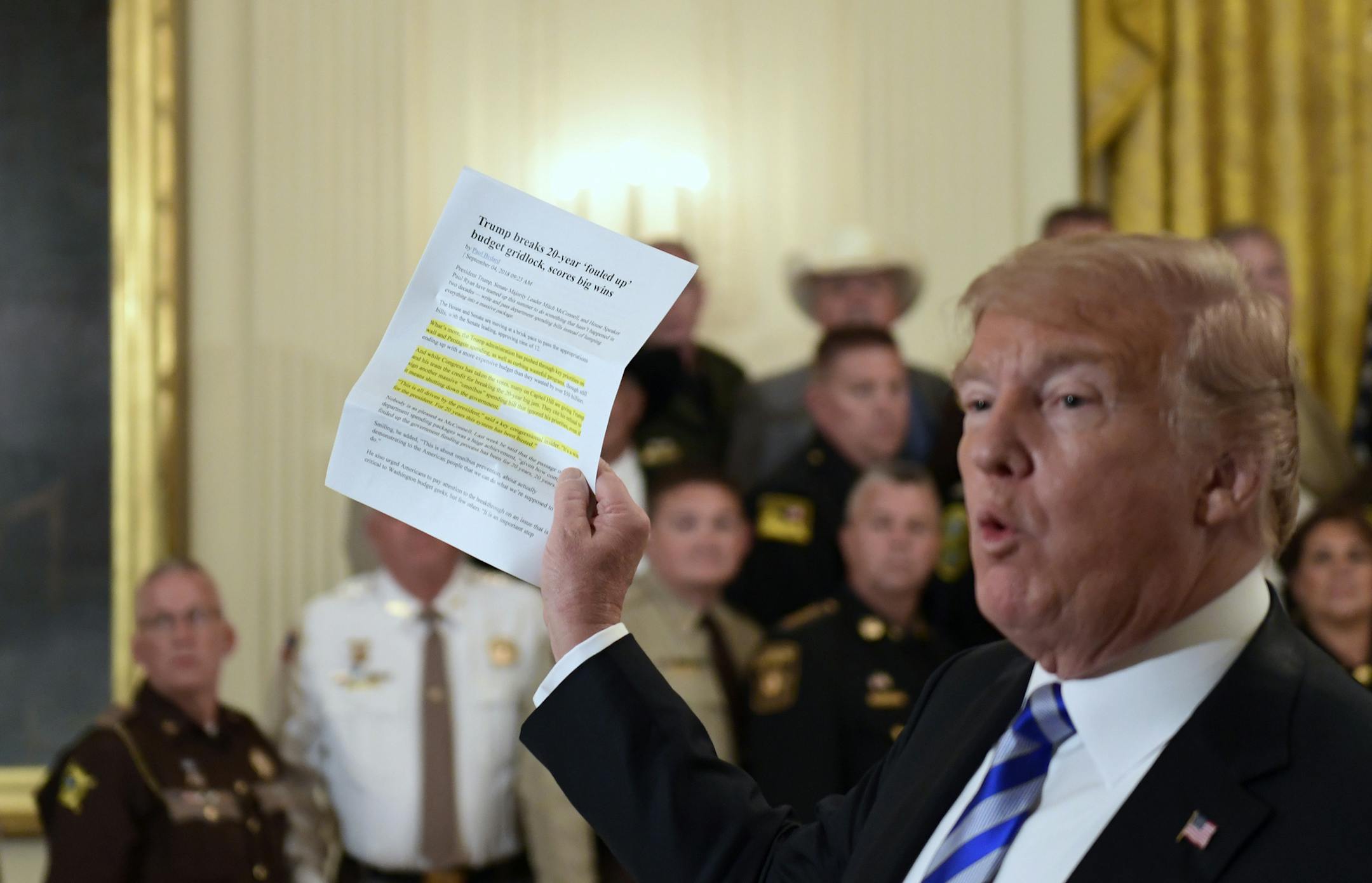 President Donald Trump responds to a reporters question during an event with sheriffs in the East Room of the White House in Washington, Wednesday, Sept. 5, 2018. (AP Photo/Susan Walsh)